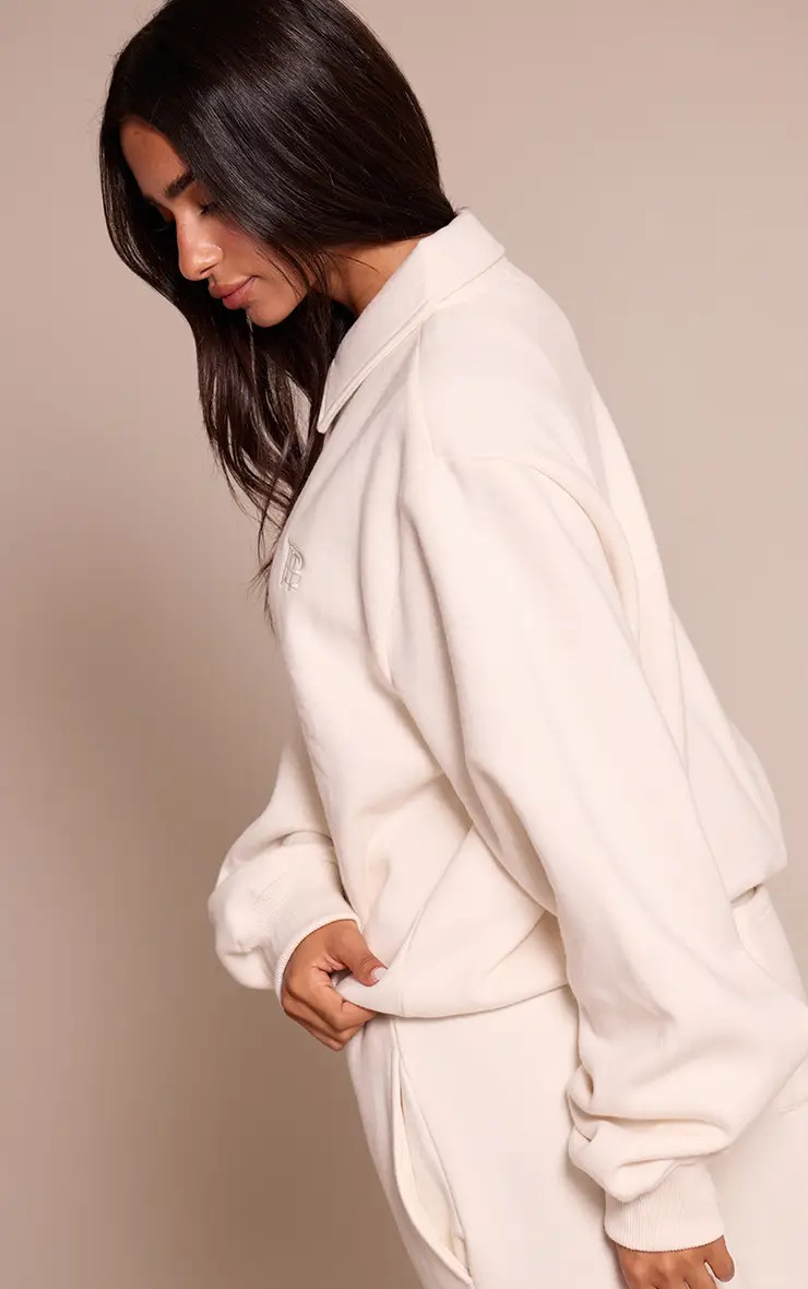 Hoodies & Sweatshirts | Petite White Prettylittlething Polo Sweatshirt | PrettyLittleThing | PrettyLittleThing UK