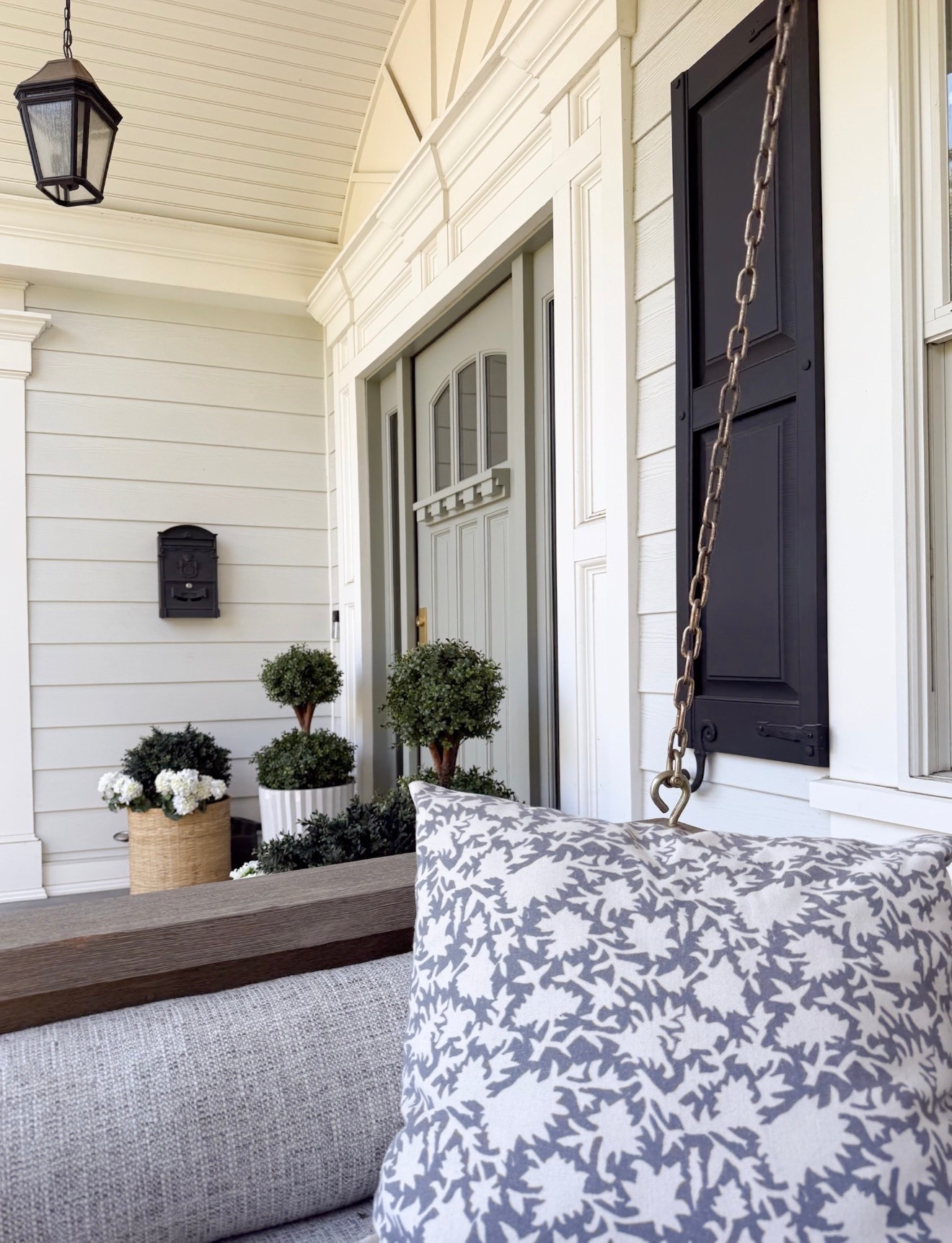 Spring front porch inspo!  Our porch swing is one of the best purchases we made — such a fun spot to sit and relax in the warm weather! We painted our front door “Pigeon” by Farrow & Ball. Linking our planters and plants too!

#LTKselfcare #LTKSeasonal #LTKHome