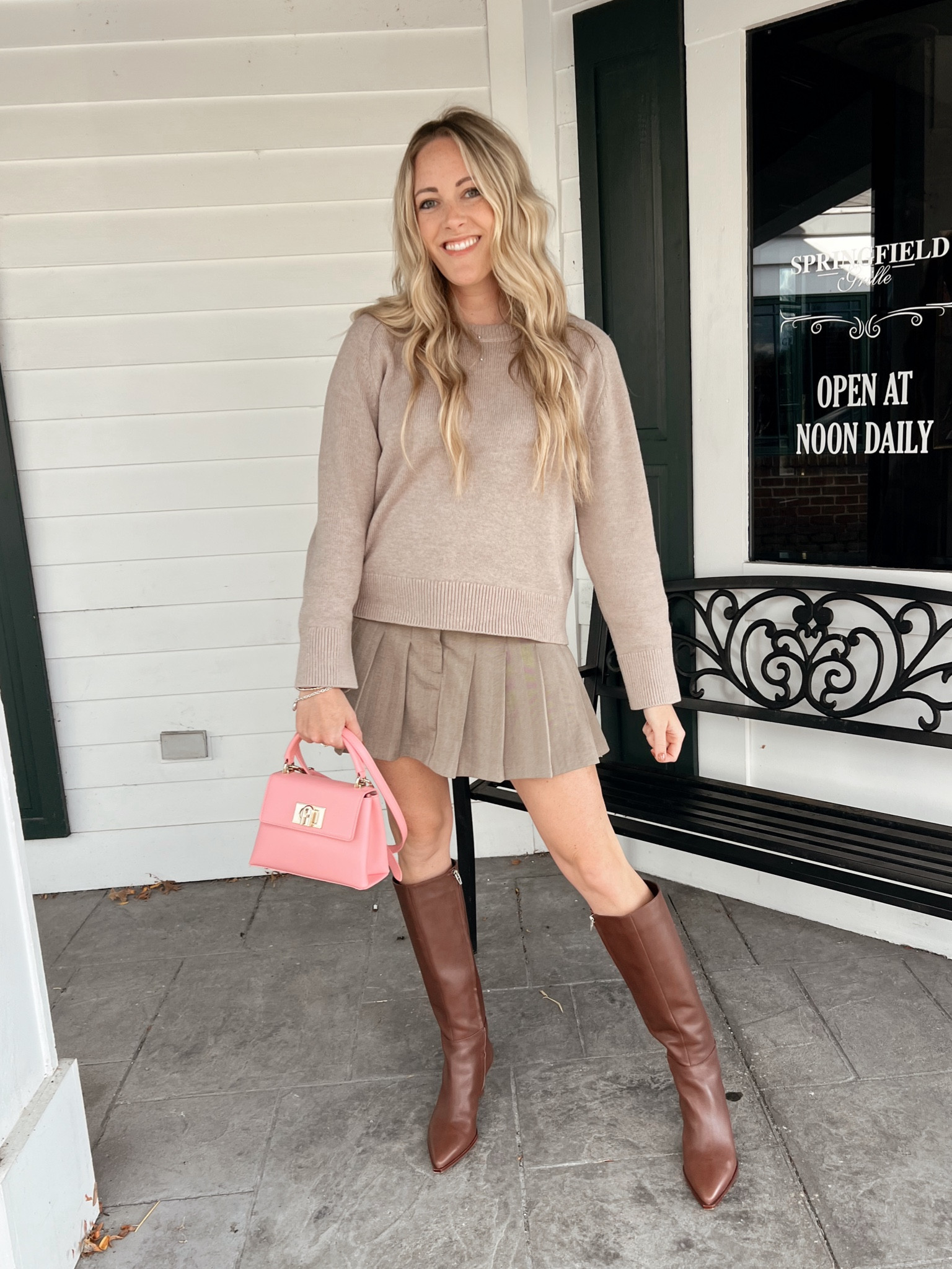 The best brown knee high boots from Dolce Vita. Pleated skirt and crew sweater Abercrombie. 

#LTKFindsUnder100 #LTKShoeCrush #LTKWorkwear