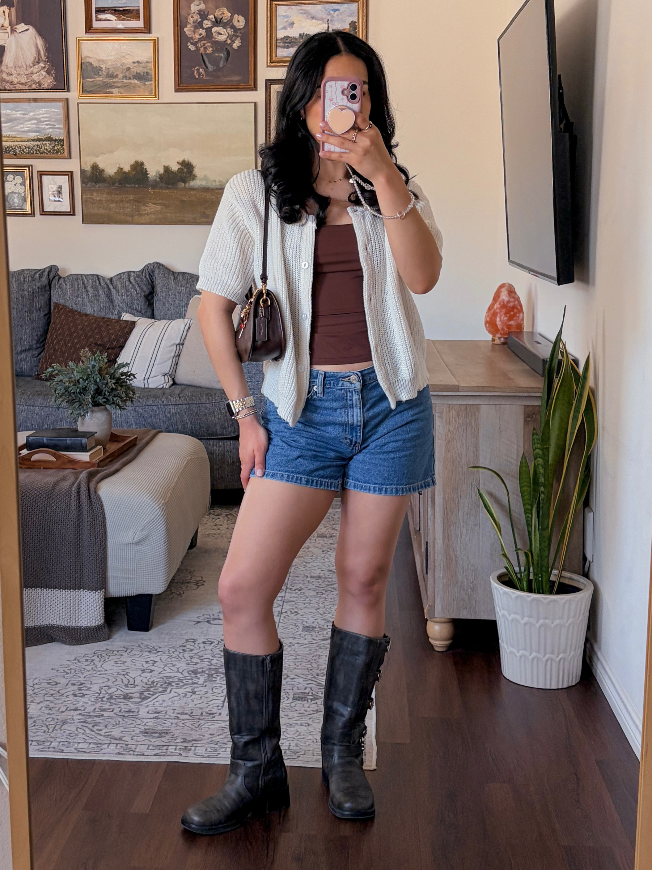outfit of the day 🤎 casual laidback outfit, cami tank top outfit, short sleeve cardigan styling, medium wash jeans shorts, relaxed denim shorts outfit, everyday casual outfit, effortless casual style, neutral outfit inspo, thrifted jeans outfit, shorts relaxed outfit, cardigan top outfit, moto boots style shoes, brown coach shoulder bag outfit, coach bag styling, casual denim outfit ideas, brown shoulder bag outfit, casual outfit, boots for spring styling, minimalist accessories, everyday bag outfit, neutral accessories outfit, laid back chic, effortless everyday style, pinterest inspired outfit, cool girl casual, minimalist casual outfit, comfy but put together, relaxed weekend outfit, casual outfit inspo pinterest, neutral outfit board, everyday outfit ideas, simple outfit formula, fashion mirror selfie  

 #LTKSpringSale #LTKgrwm #LTKootd