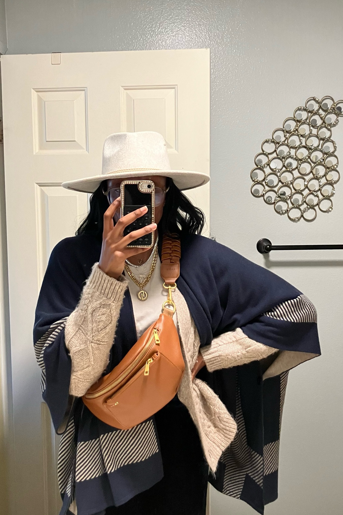 Ponchos are in!!! They are perfect for layering for extra warmth. Here are some similar below 
Fanny pack is from Fawn Design

#LTKtravel #LTKstyletip #LTKSeasonal