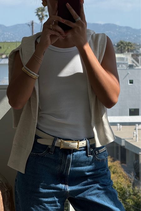 classic ootd | white Calvin Klein cotton tank, white  cotton sweater, revolve white belt, Calvin Klein 90's jeans, heaven mayhem earrings

#LTKSeasonal #LTKfindsunder100 #LTKstyletip