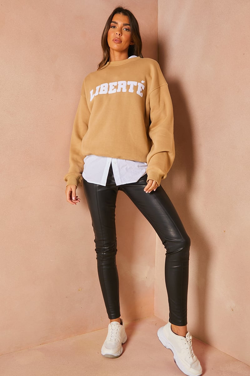 LORNA LUXE TAN TEDDY BORG 'LIBERTE' APPLIQUE OVERSIZED SWEATSHIRT | In The Style (UK)