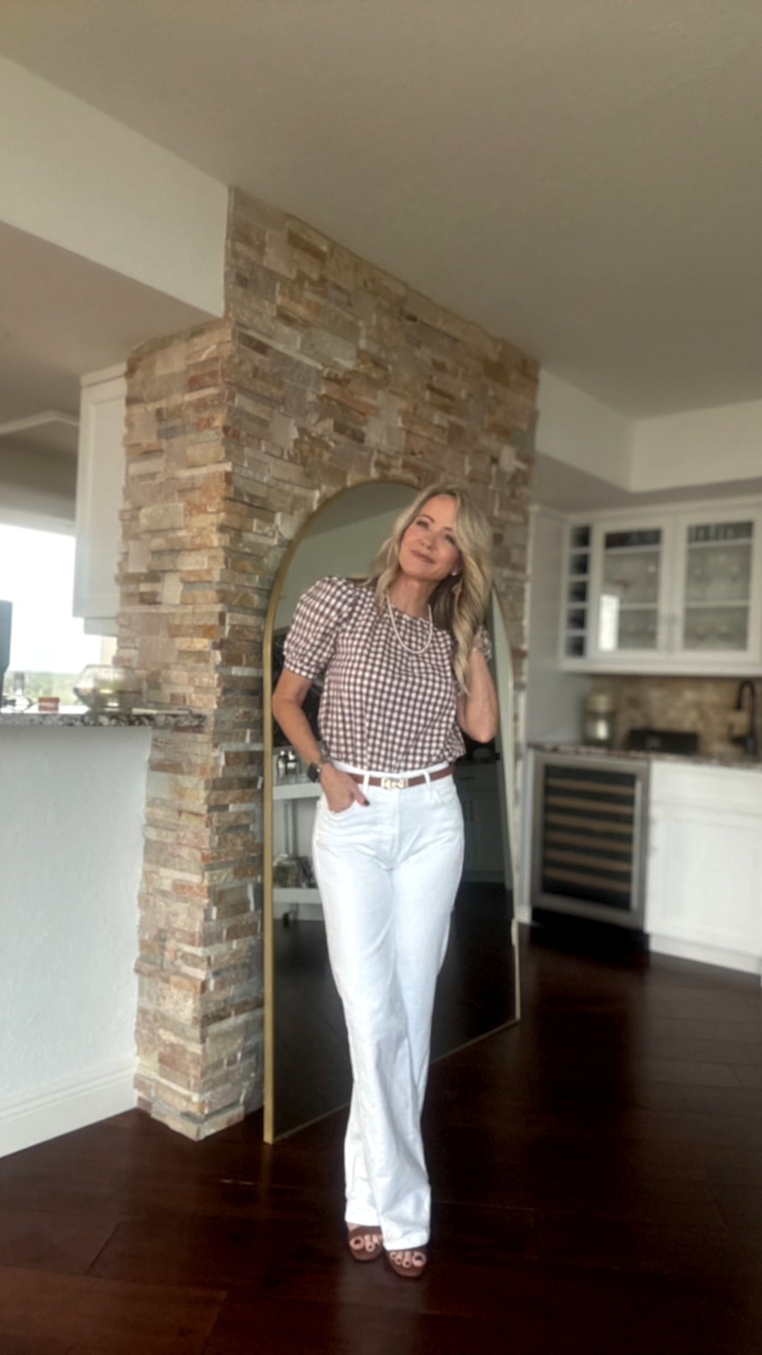 Chic + classic ✨ Styling a puff-sleeve gingham top with white denim for a fresh, polished look. Add sandals and a belt and you’re ready for brunch, errands, or date night. 🤍🤎. It keeps selling out, so do the “get notified” for when its back in stock! 
Shop the full look here ⬇️

#LTKWorkwear #LTKStyleTip #LTKOver40