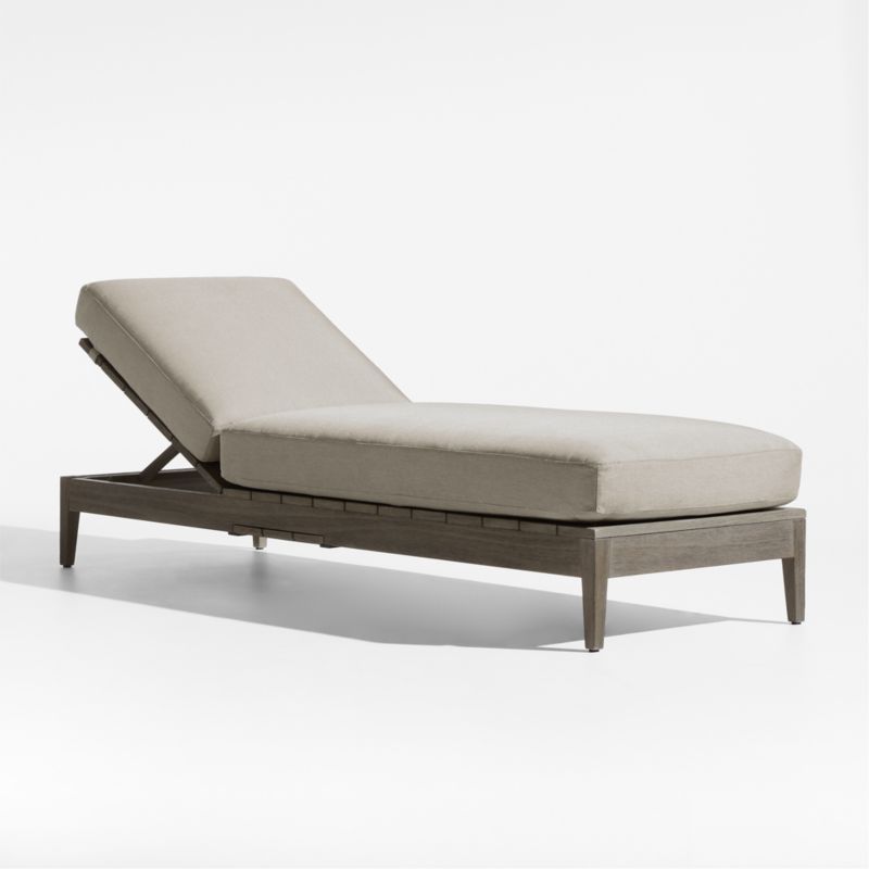 Andorra Weathered Grey Wood Outdoor Chaise Lounge with Taupe Cushions | Crate & Barrel | Crate & Barrel