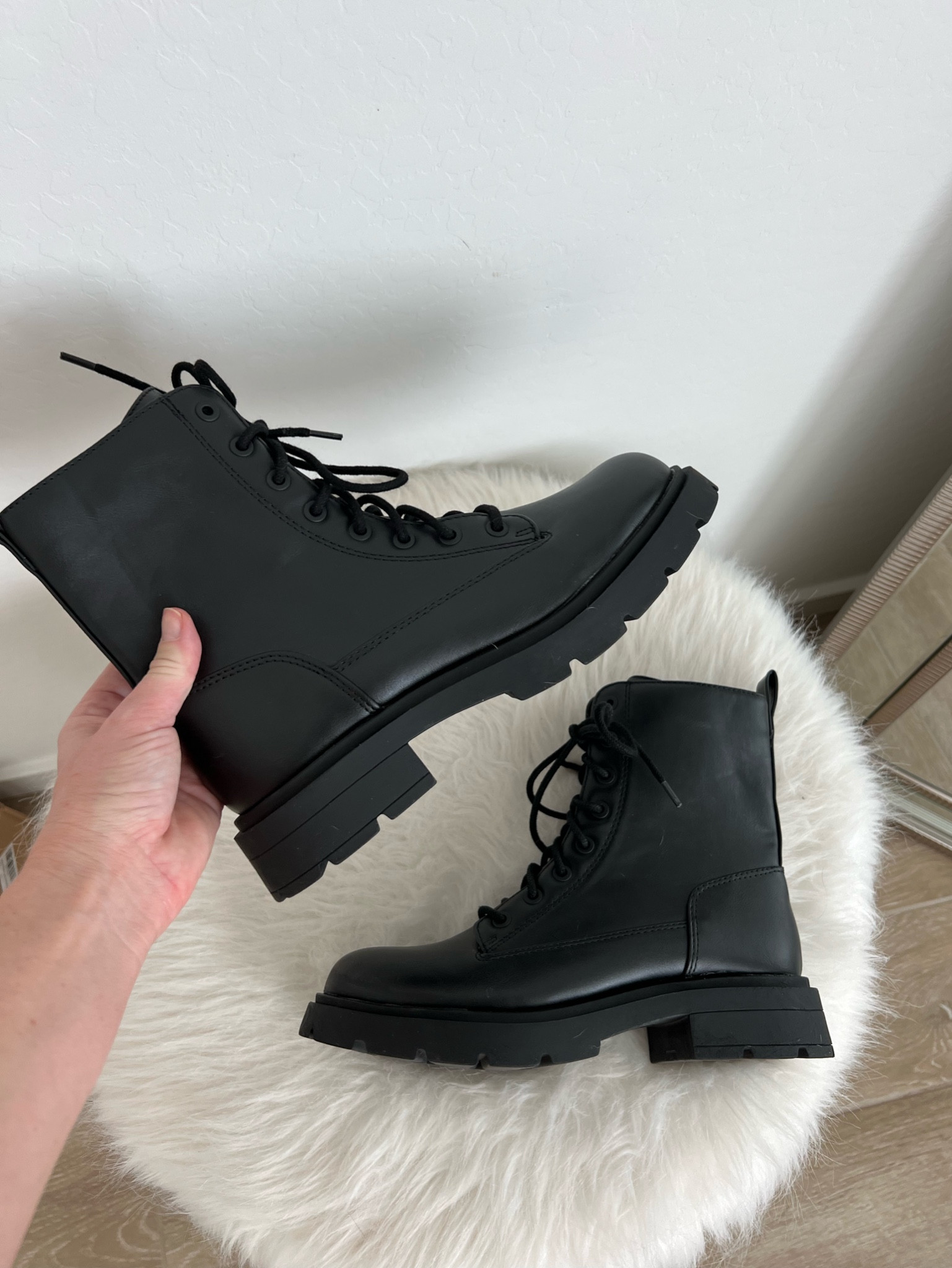 Walmart boots!! Affordable black combat boots that are so cute for fall and winter. Runs big size down a half size 

#LTKshoecrush #LTKunder50 #LTKunder100