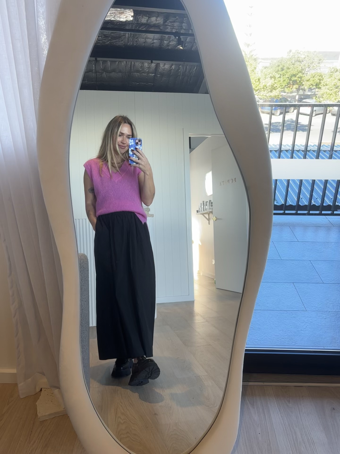 The perfect black maxi- I am wearing size small. True to size 
I sized up to a large in the vest 