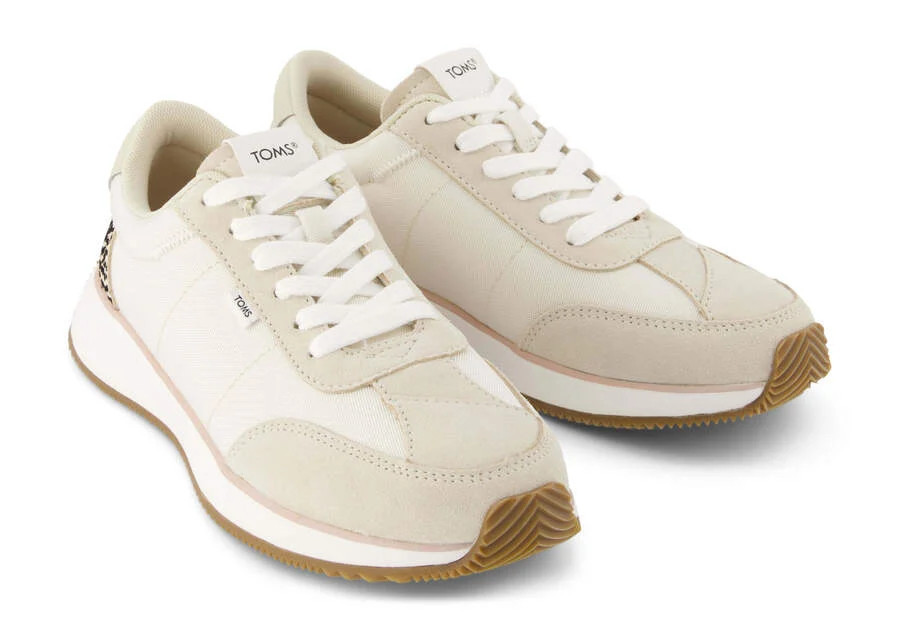 Women
Wyndon Natural Mini Cheetah Jogger Sneaker | Toms Americas