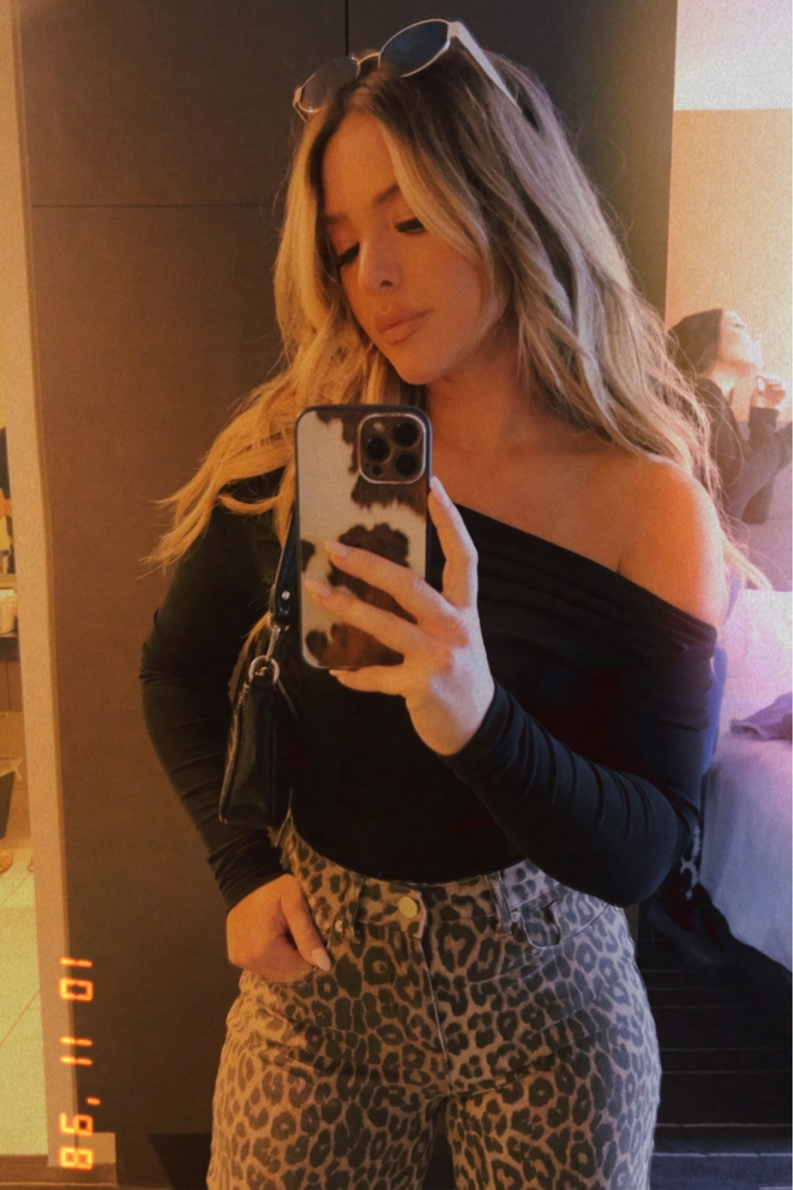 Leopard denim, gold sunglasses, off the shoulder long sleeve 