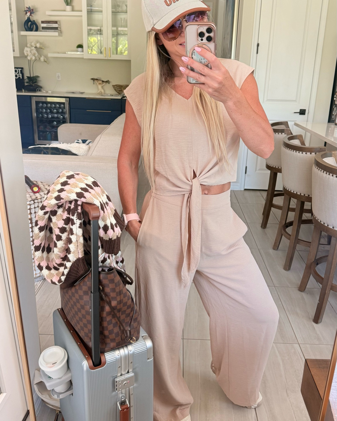 Neutral travel outfits always look so polished 🤍 This set gives me the comfort I want for a flight but still feels put together enough to wear once I arrive. I love the relaxed pants and simple top together for an easy travel day look.

neutral airport outfit, beige travel set, matching set women, wide leg pants outfit, chic airport outfit, comfortable airplane outfit, neutral travel style, airport fashion women, travel capsule outfit, everyday matching set

#LTKActive #LTKU #LTKTravel