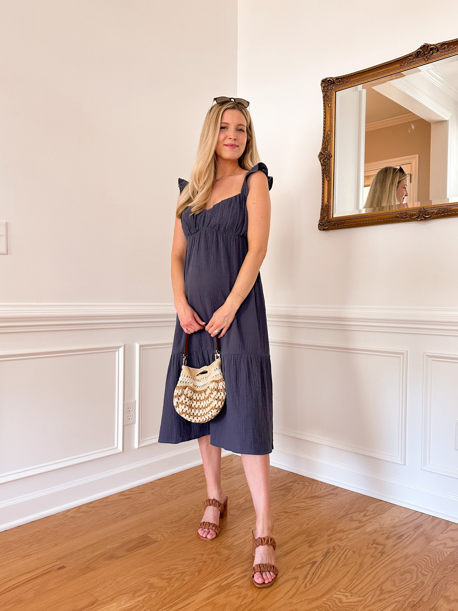 Love this navy flowy Summer dress! The ruffles on the shoulders add the perfect touch. I’m wearing a small. This dress is post bump friendly! 

#LTKunder100 #LTKbump #LTKstyletip