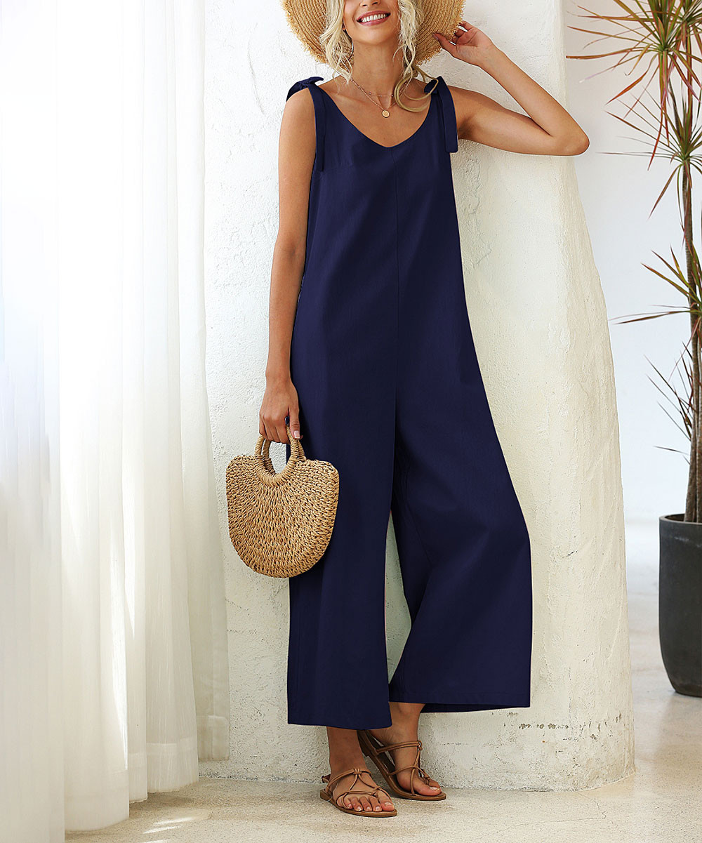 Floral Blooming Women's Jumpsuits Navy - Navy Tie-Strap Pocket Sleeveless Jumpsuit - Women | Zulily