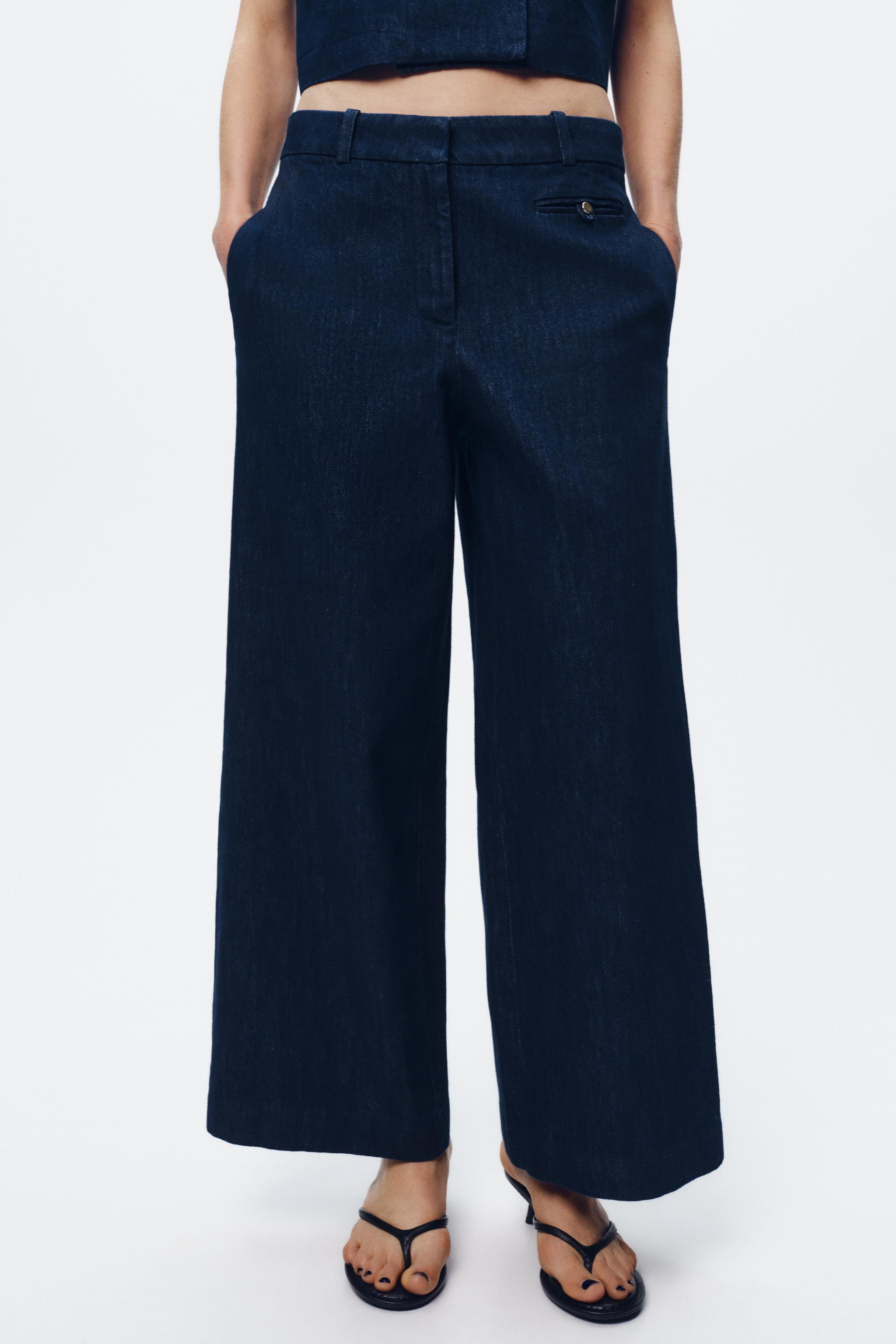 High waist pants with front pockets and back false welt pockets. Cropped wide legs. Front zip, in... | Zara US
