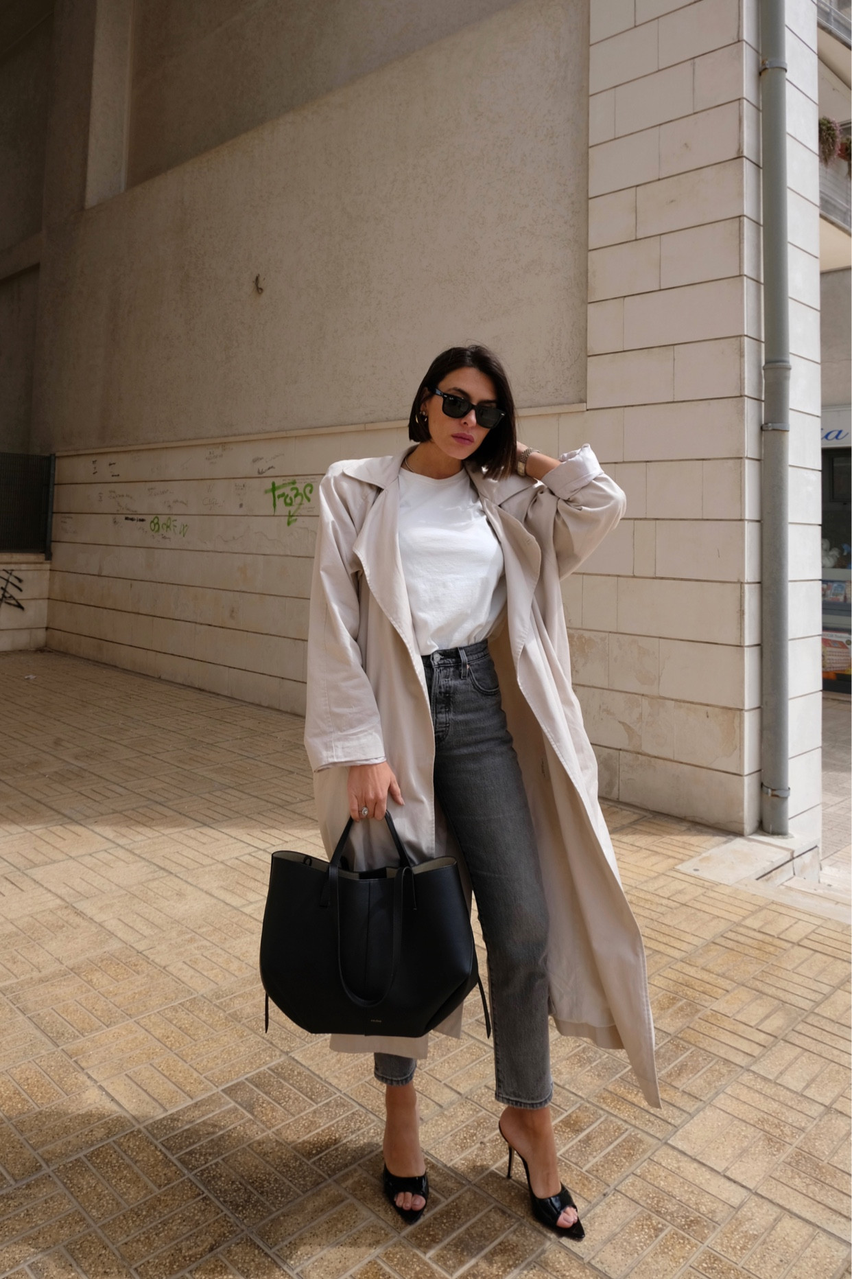 Minimal spring outfit inspiration, skinny jeans, Levi’s, Amazon, Polene, The Frankie shop, trench coat, Farfetch, Rayban, Luisaviaroma, Ssense, Vestiaire Collective, Giaborghini mules, white tshirt, Italy, capsule wardrobe, wardrobe essentials. 

#LTKeurope #LTKfit #LTKSeasonal