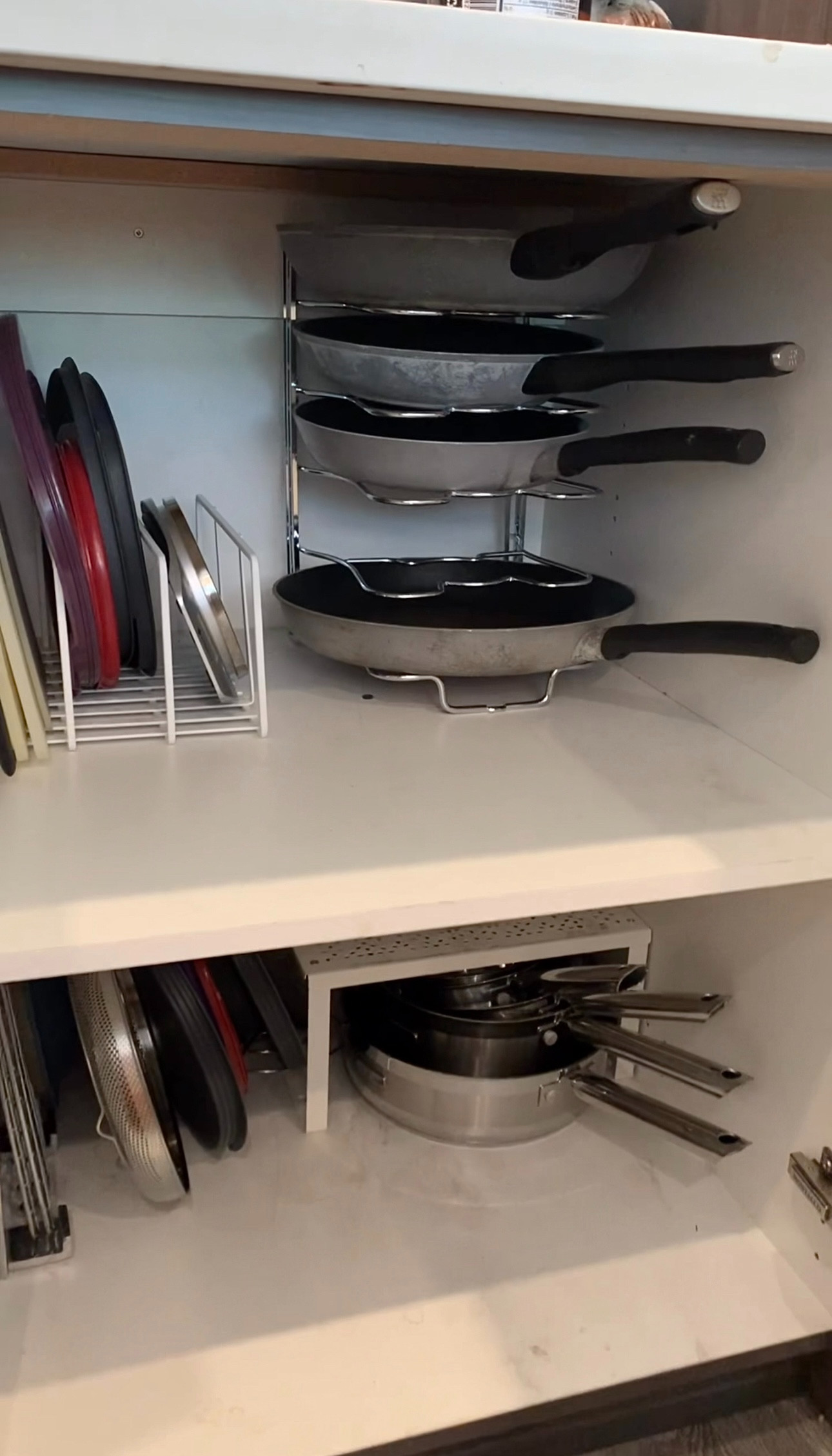 This pot and pan organizer is one of those simple Amazon finds that makes a huge difference in your kitchen. Instead of stacking pans on top of each other and creating a mess every time you need one, this keeps everything neatly separated, organized, and easy to grab. It can be used vertically or horizontally depending on your cabinet space, and it helps protect your cookware from scratches while freeing up valuable storage space. If you're trying to get your kitchen organized, this is one of those inexpensive upgrades that instantly makes your cabinets feel more functional. Linked here. 

 #LTKdayinmylife #LTKmomlife #LTKHome