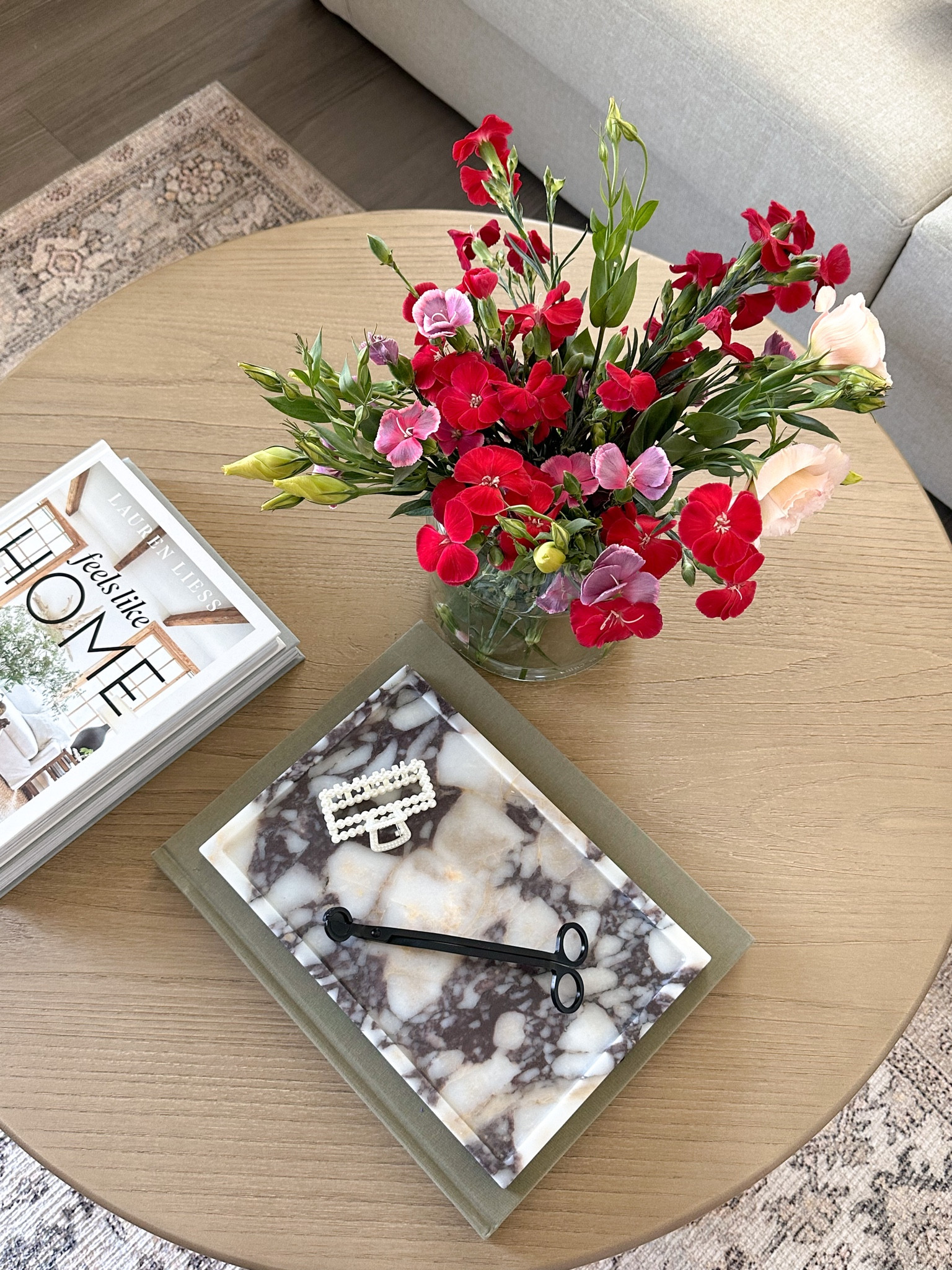 Marble tray, coffee table books, round wood coffee table #Amazonfinds #AmazonHomeFinds 

#LTKhome