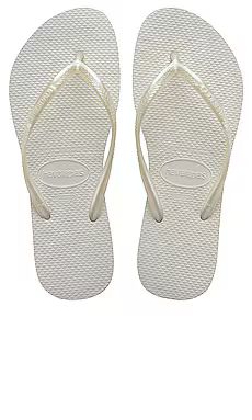 Havaianas Slim Flip Flop in White from Revolve.com | Revolve Clothing (Global)