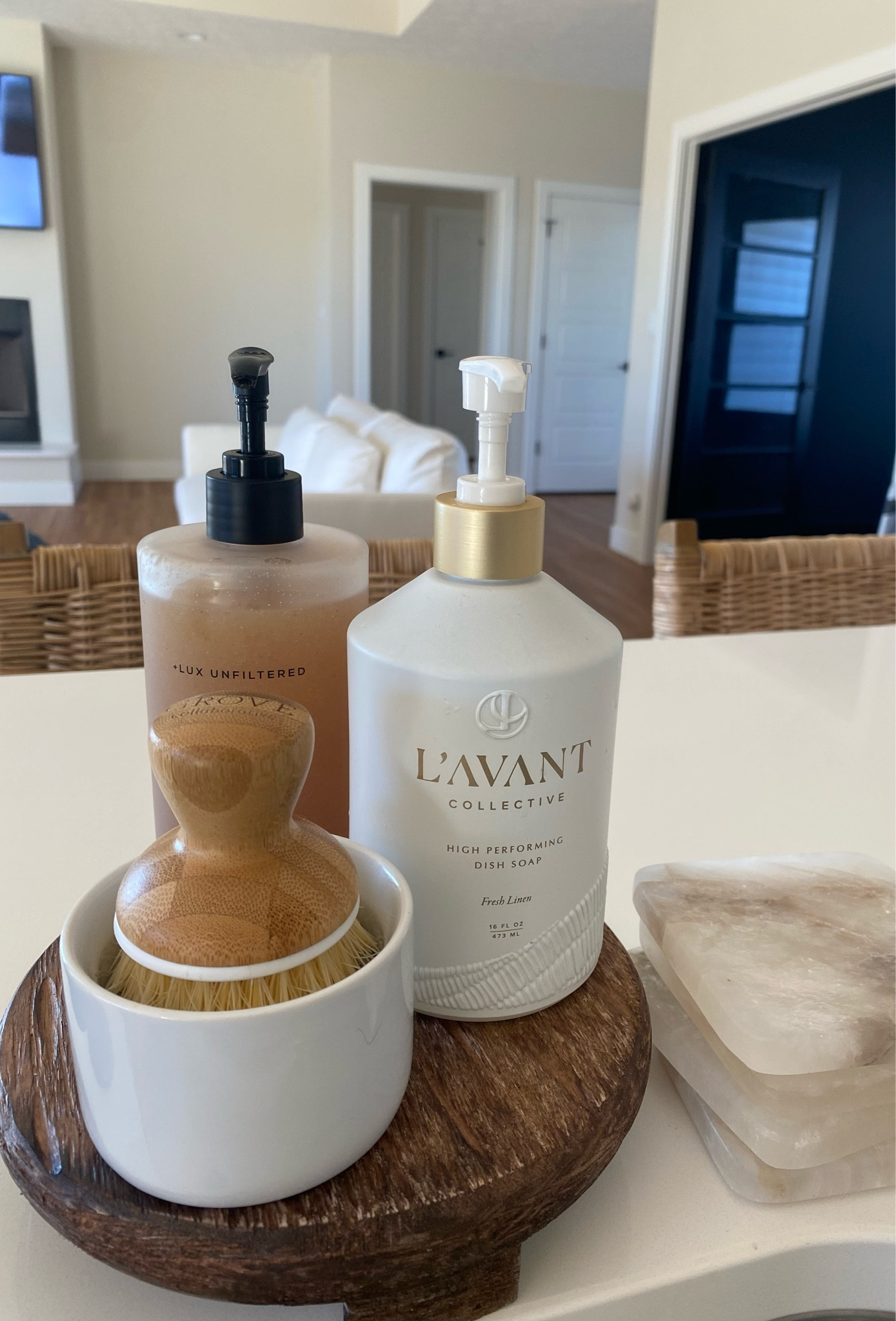 Setup next to my kicthen sink with the most amazing scent combos and the incredible scrub brush that is super adorable but most importantly makes my soap last 5x longer !!! 