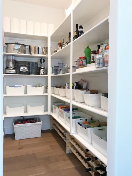 Looks like we have a break in the rain until next week. If it was a rainy weekend ahead, I’d spend it cleaning out my pantry! Anyone else have the spring itch to start cleaning? In this pantry, they wanted a mix of plastic white handled bins and soft rope bins. I added wine racks under the shelving as well. Love how bright and clean it is! Open-topped containment lets they see everything 🤍

#LTKhome #LTKfamily
