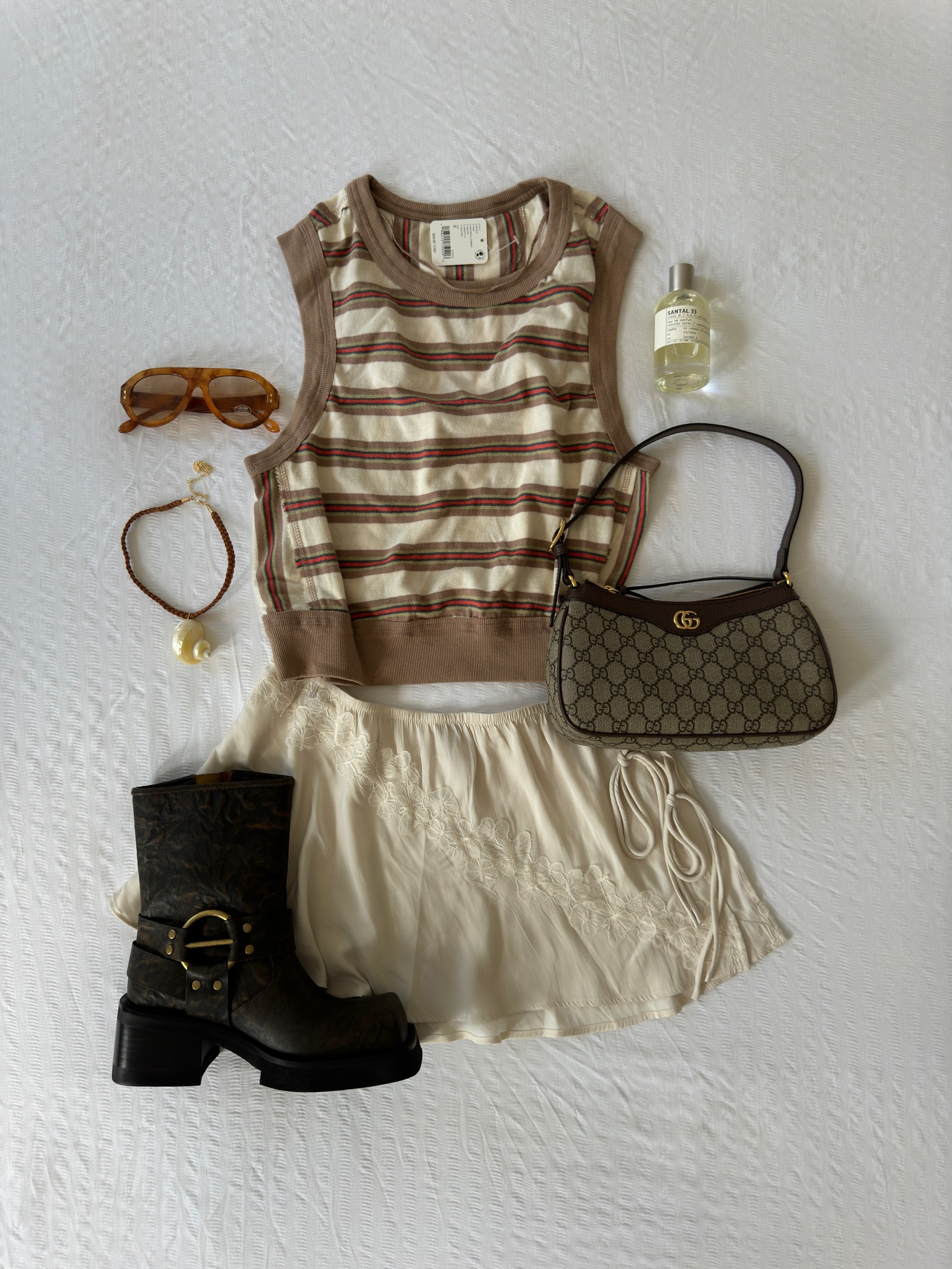 Lisbon outfit - free people ⭐️
Stripe vest satin skirt chunky boot jeffrey Campbell Gucci le labo 