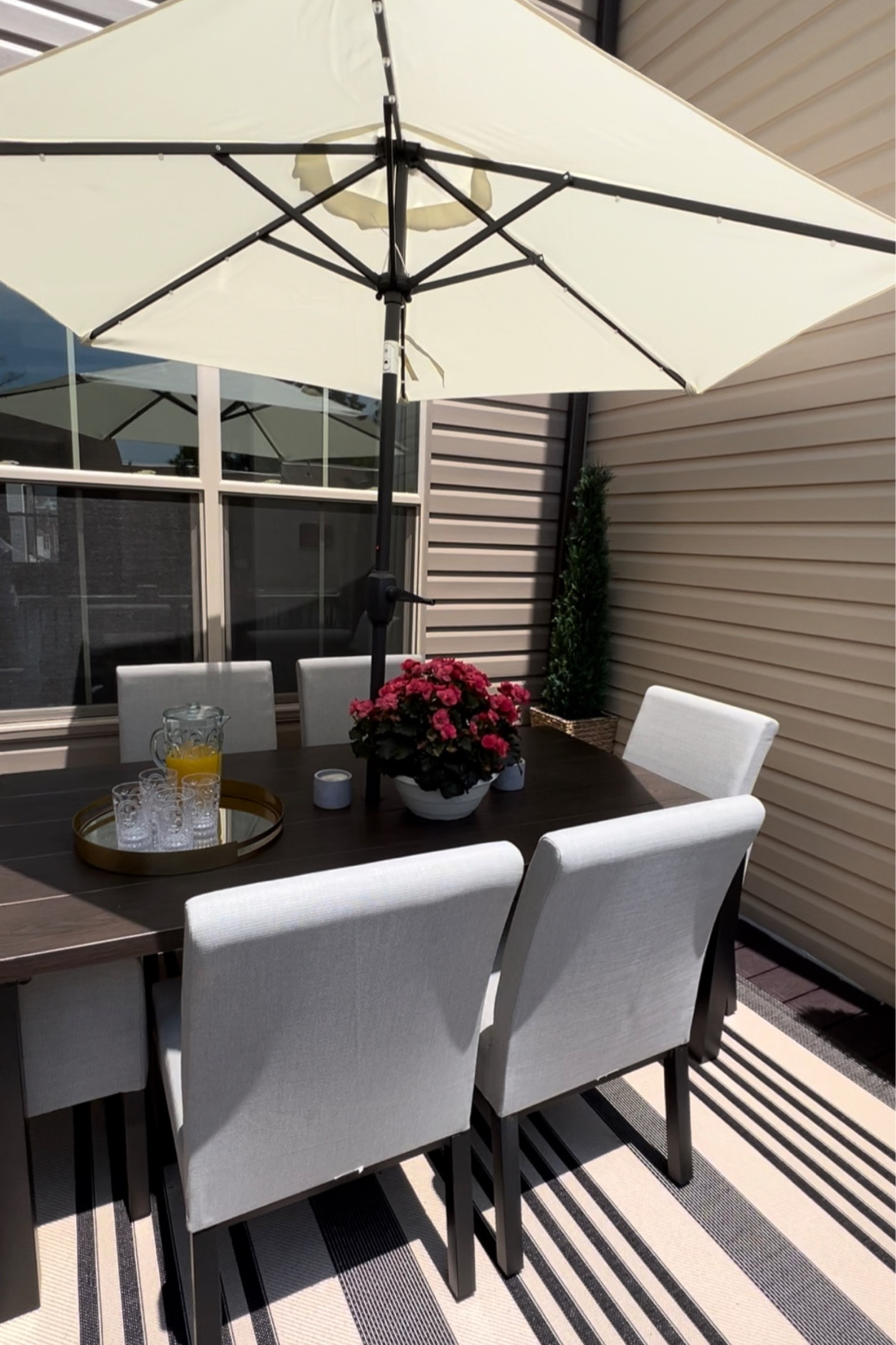 #sponsored Happily soak up the summer sun by shopping for all your outdoor needs with @Wayfair. They have thousands of products that ship fast like outdoor furniture, tableware, grills and decor. Shop this beautiful rug, umbrella, and umbrella stand from @Wayfair #Wayfair 

#LTKhome #LTKFind