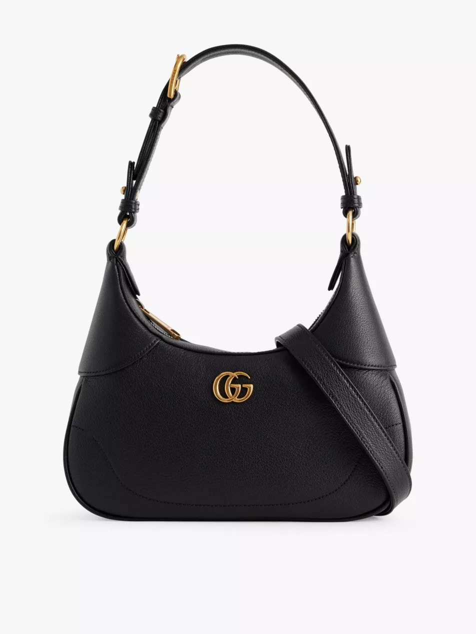 Aphrodite curved leather shoulder bag | Selfridges