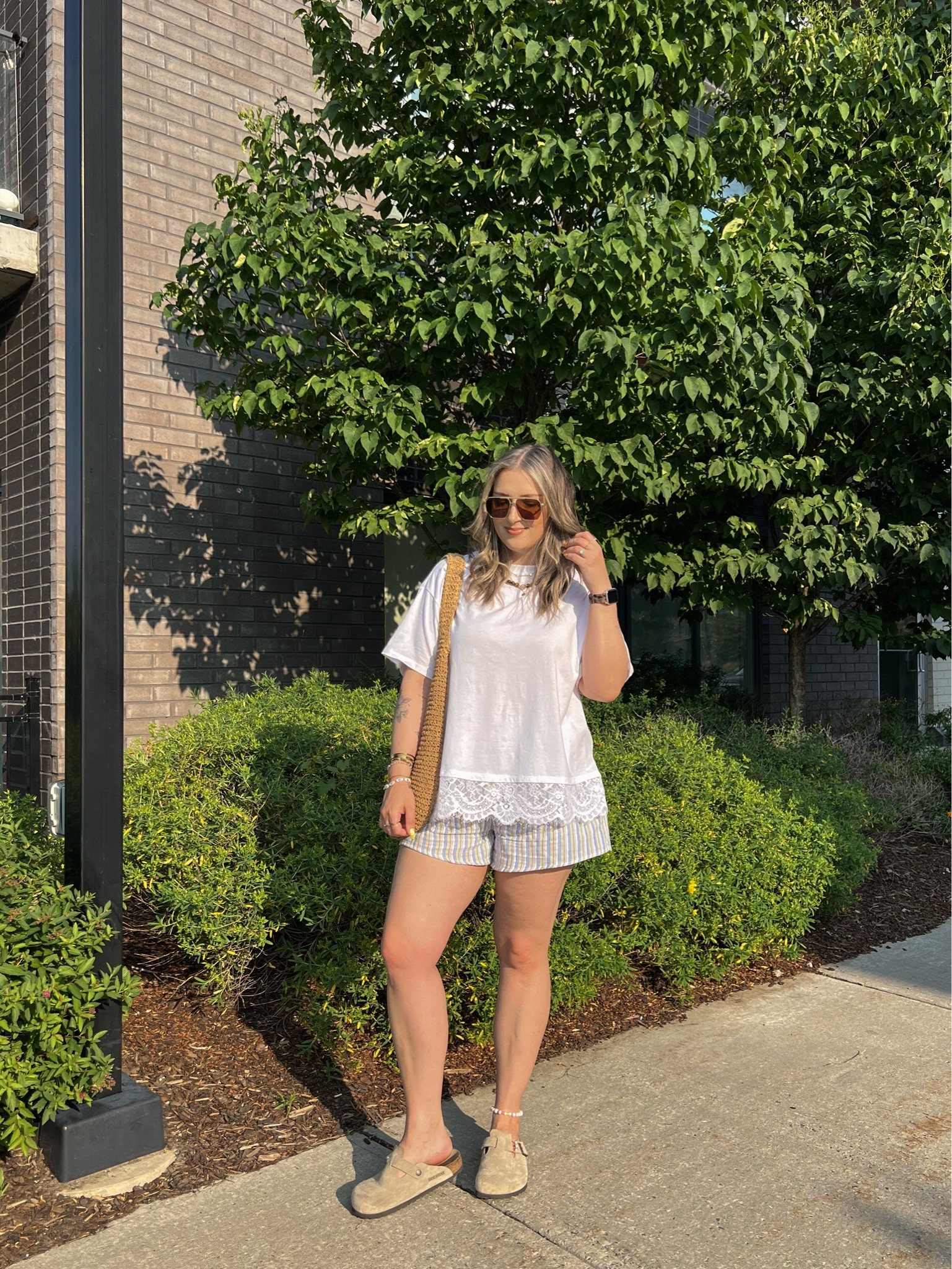 Comfy casual summer outfit! Wearing my usual size L in both the lace trim tee and striped shorts. Canadian Old Navy links are under “similar products”. I’m a 9.5-10 shoe and wear a 40 in the Birkenstock Boston clogs

#LTKsummer #LTKmidsize #LTKstyletip