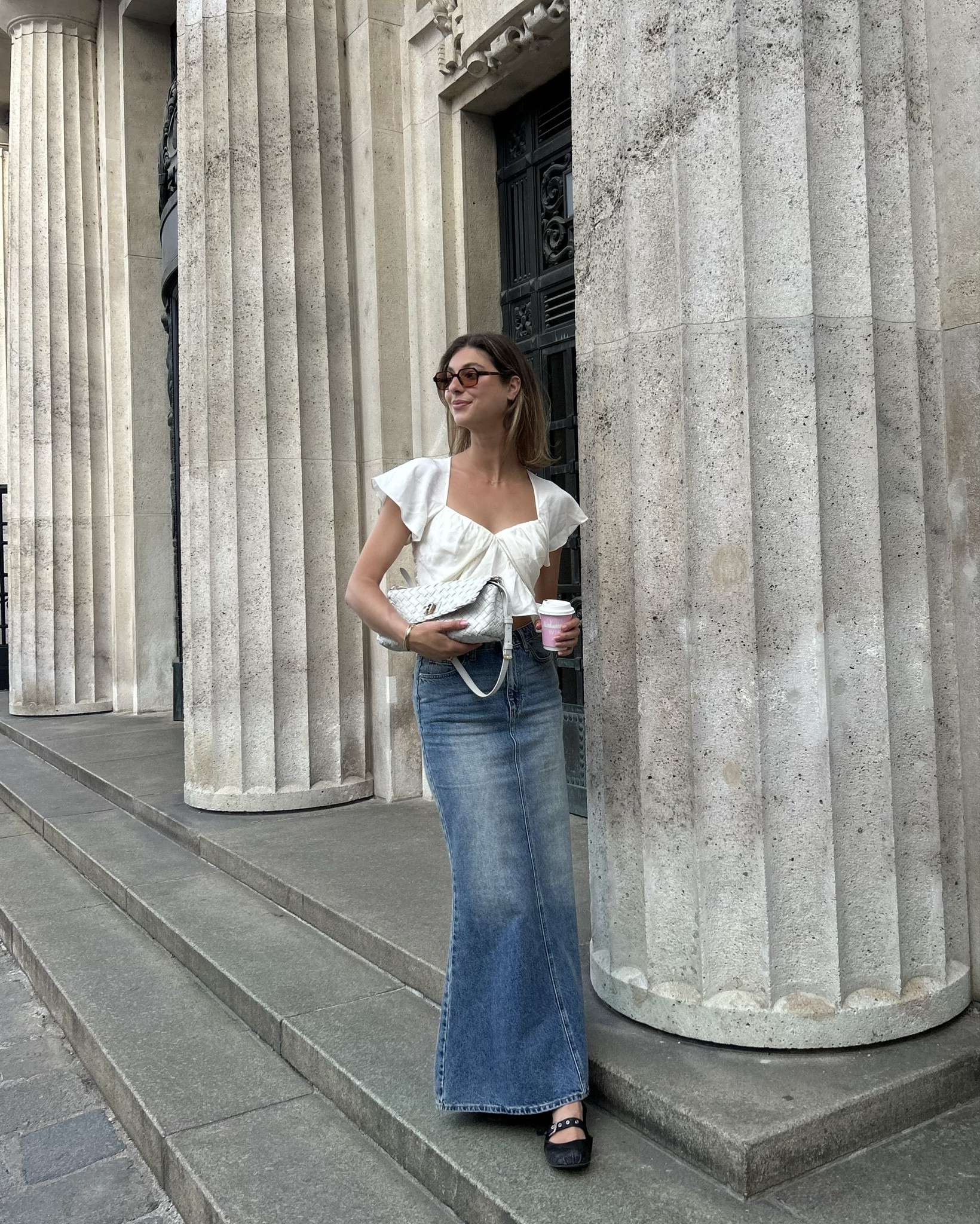 Long denim mermaid skirt 
White cute ruffle top
Furla baguette bag white leather
Sunglasses with orange lens