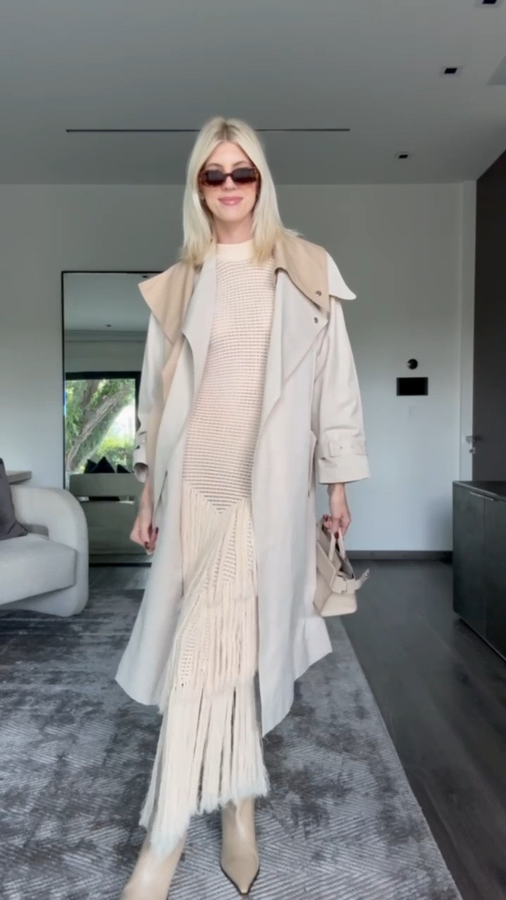 How adorable is this fringe dress paired with a trench for fall? 🫶🏼 Paired it with cream boots, a bag & tortoise sunnies from DW. 

#LTKStyleTip #LTKSeasonal #LTKShoeCrush