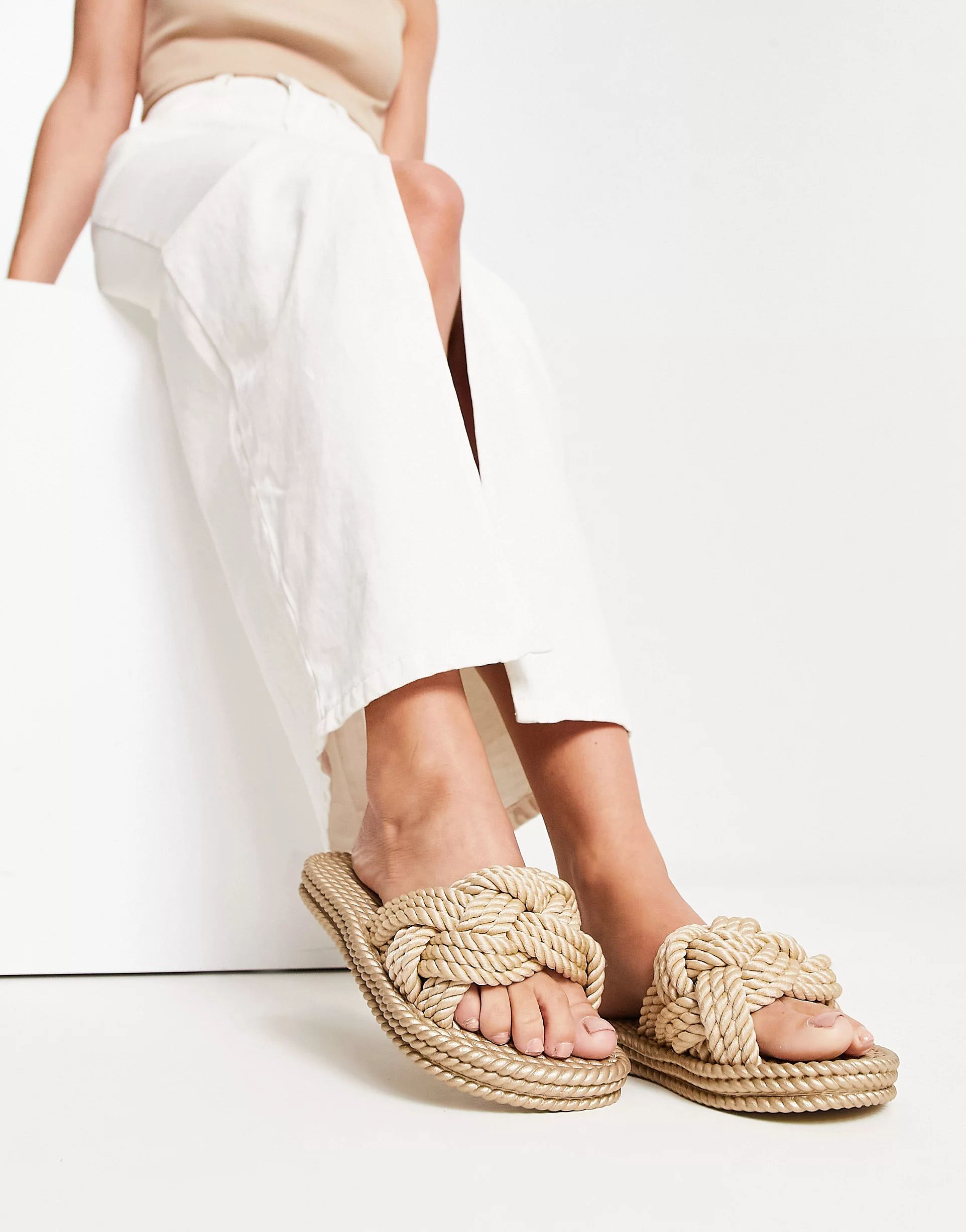 ASOS DESIGN Jinx knot jelly sandals in gold | ASOS (Global)