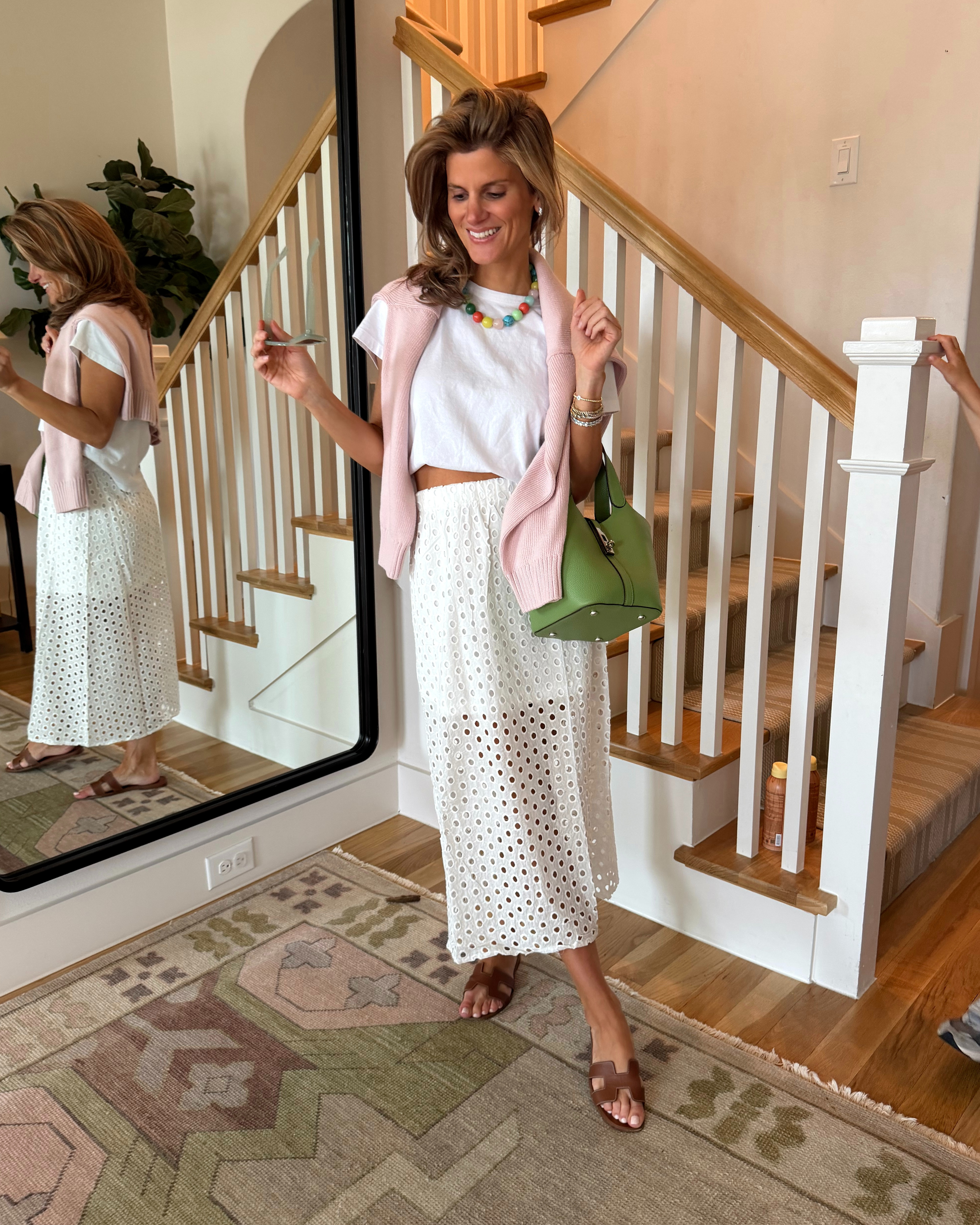 Monochromatic white look with Amazon eyelet skirt and favorite white leset tee. Pops of color with Amazon bag and tuckernuck chunky neckalce 

 