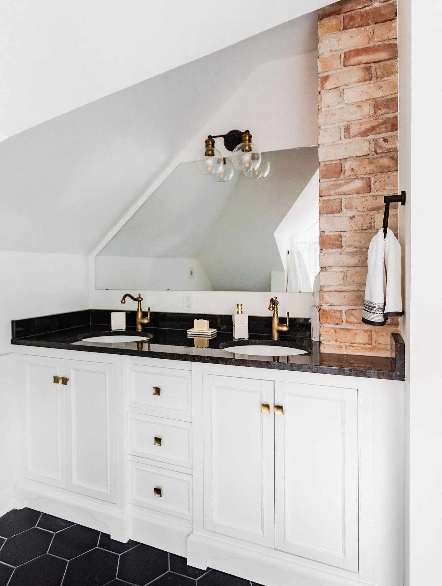 It's time to rethink the humble attic. 

As an interior designer, I believe that these often-overlooked spaces have tremendous potential. Not only can renovating your attic expand your living space, but it can also provide a significant return on💲investment.

So check out our #holmesaverefresh project for inspiration on how to create a stunning attic en-suite. And don’t forget the rubber ducky.

📸 @chelsielopezproduction 

#attic #atticrenovation #ensuitebathroom #ensuite #neutralhomeedit #oldhomes #mnhomes #bathroomvanities #lovewhereyoudwell