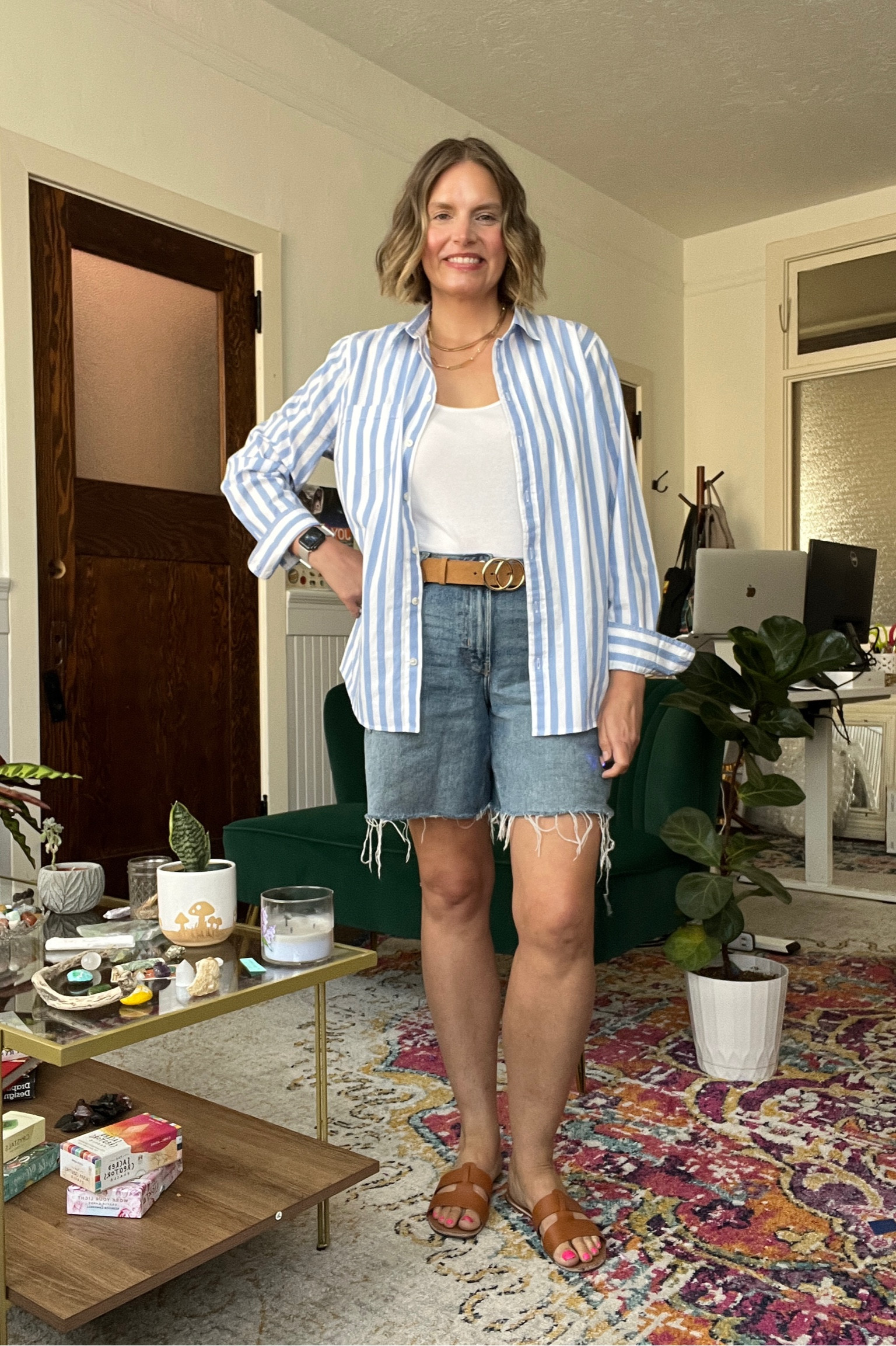 Outfit formula: striped button-down top, white, tank top, brown belt, denim shorts, and sandals

#LTKworkwear #LTKSeasonal #LTKstyletip