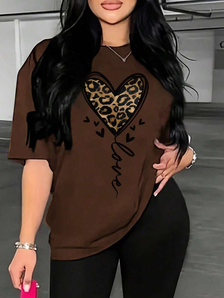 $7.79
$9.49
-18%

Save $0.39 off this item after joining.
VaVaBold Women's Heart Leopard Print Loose Fit Oversized Drop Shoulder T-Shirt Graphic Tees Women Tops
4.95
(1000+)
Size
US
Size Guide
4 (S)
6 (M)
8/10 (L)
12 (XL)
Curve
Not your size? Tell me your size 
 | SHEIN