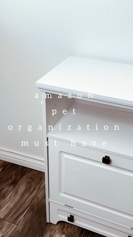 🐾 Can we just talk about how much I adore this Dog Feeding Station? 🐶 It's like a little oasis for my furry friend! Not only does it make feeding time a breeze, but it also adds a touch of charm to our home decor.
Grab Yours Here: https://amzn.to/4cAMlsG

Putting it together was a total breeze—trust me, I'm no DIY expert, but this was a piece of cake! Plus, it's sturdy enough to hold an entire bag of dog food, which means fewer trips to the store for me. Win-win!

One of my favorite features? The storage compartments! I stash all of my pup's toys in the middle section for easy access during playtime. And those adorable jars on the top? Perfect for keeping her treats fresh and within paw's reach.

Honestly, it's been a game-changer in terms of organization. No more scattered toys or half-empty treat bags cluttering up the place. 🏡 If you're a pet parent like me, you know the struggle of keeping things tidy. This station is the answer to all our prayers!

In short, it's not just a feeding station—it's a lifesaver! Highly recommend it to anyone looking to add a dash of functionality and cuteness to their pet care routine. Trust me, your furry friend will thank you! #doglover #dogslife #dogfood #dogfunny #homeorganizer #organizedliving #amazonhomefinds #amazonfind #founditonamazon #amazonhome #amazonfinds

#LTKVideo #LTKstyletip #LTKhome