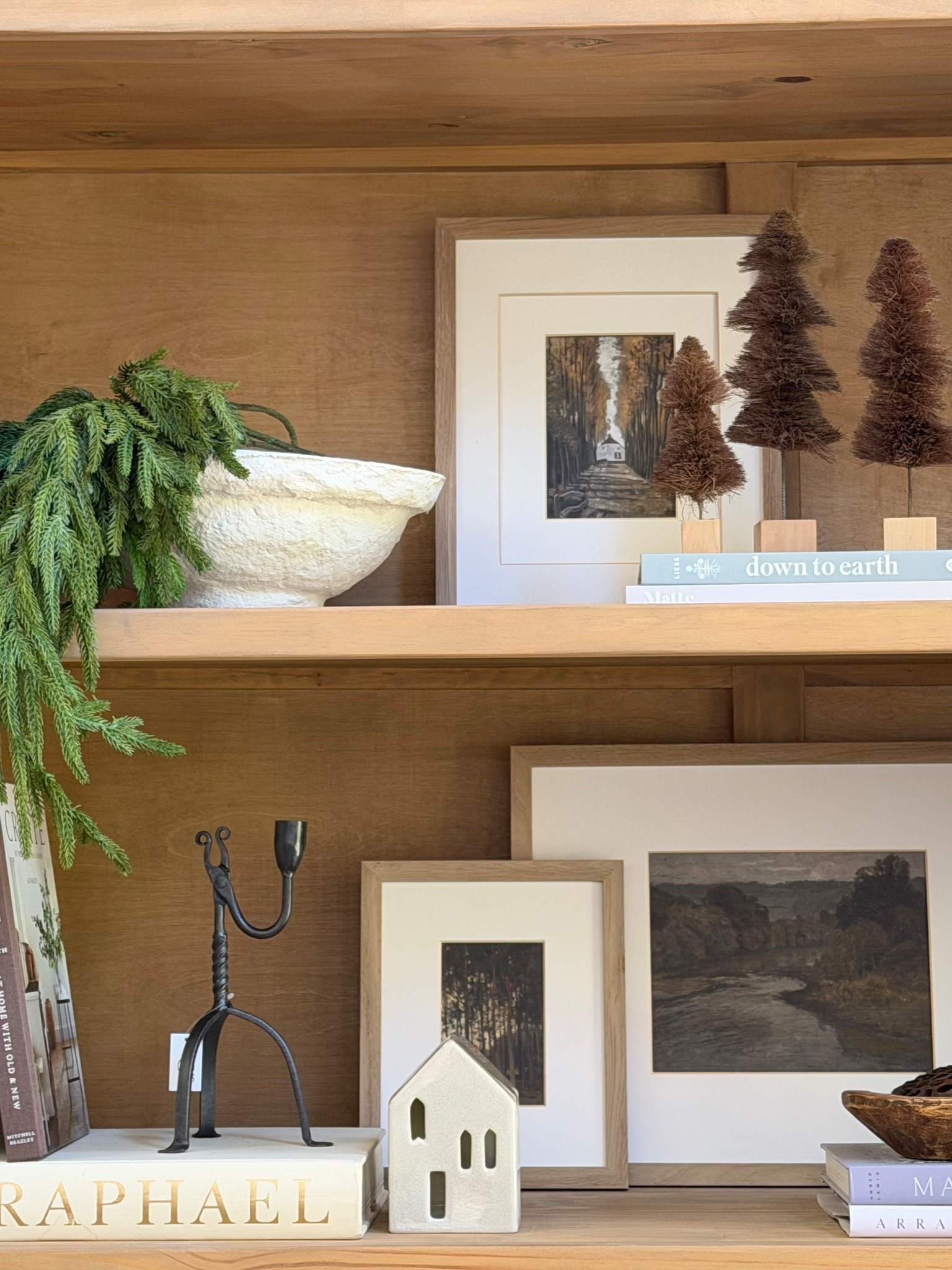 Christmas shelf decor
Bottle Brush trees, iron candle holder, Norfolk pine stems, reactive glazed Christmas village
Ceramic Christmas village

Amber interiors style
Rustic Christmas decor
Aflorall

#LTKHome #LTKHoliday #LTKFindsUnder50