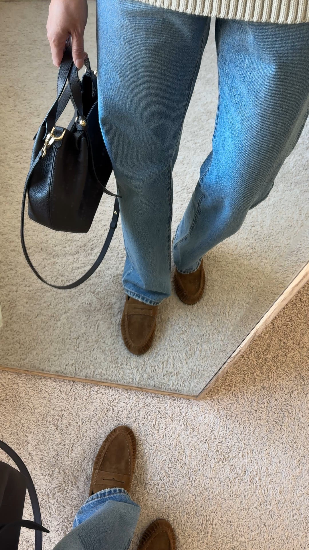 Casual chic loafer mules. Modern classic style. I’ve been wanting add a pair of loafers to my wardrobe for a while now, but couldn’t seem to find the right ones for me. Searching for more casual to wear mostly with jeans. I’m still looking to try a full loafer style, but these mules drew me in. I love ruched leather look. 
- Sizing seems true to size. I usually take a 6 in flats and that’s what I have here. If you intend to wear thicker socks, you could size up. 
- Comfy out of the box and seems to be good quality to last beyond a season. 
- These jeans are a good staple classic straight leg that also comes in ankle length. True 100% cotton denim that gets better with time. I size up in this style. 
- Classic cable knit sweater in an oversized fit. 
- Favorite staple white t-shirt as a base layer. 
- Convertible leather bag. Mid-priced luxury bag  


#LTKOver40 #LTKootd #LTKWorkwear