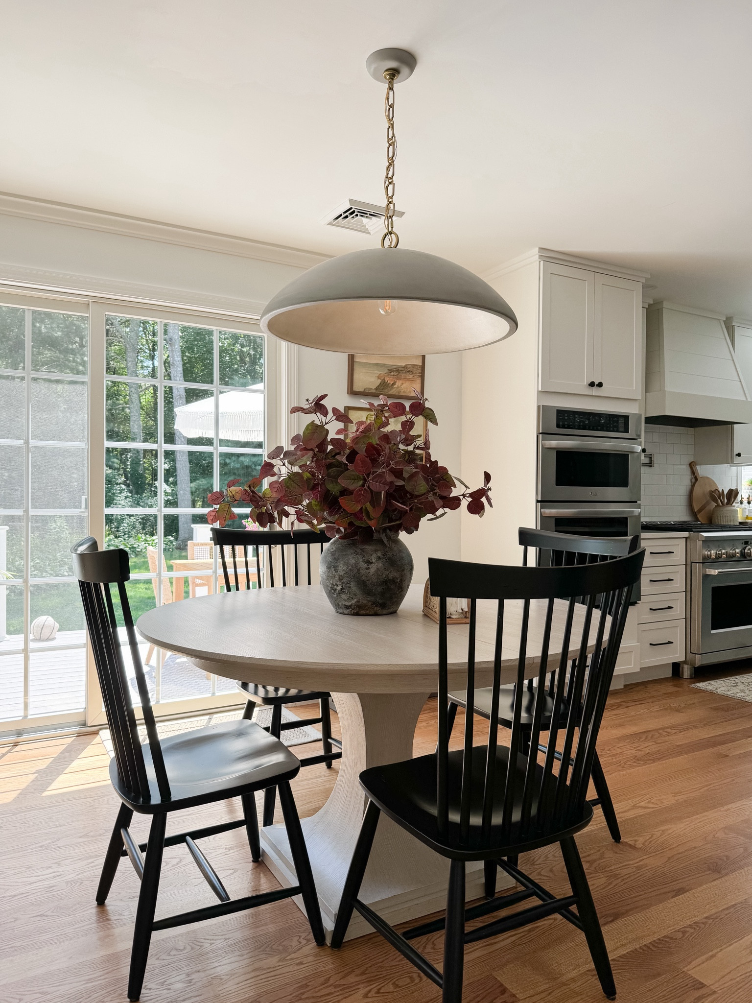 Vase and stems, fall faux florals, wall art, dining chairs, pendant light 

#LTKhome #LTKfindsunder100 #LTKSeasonal