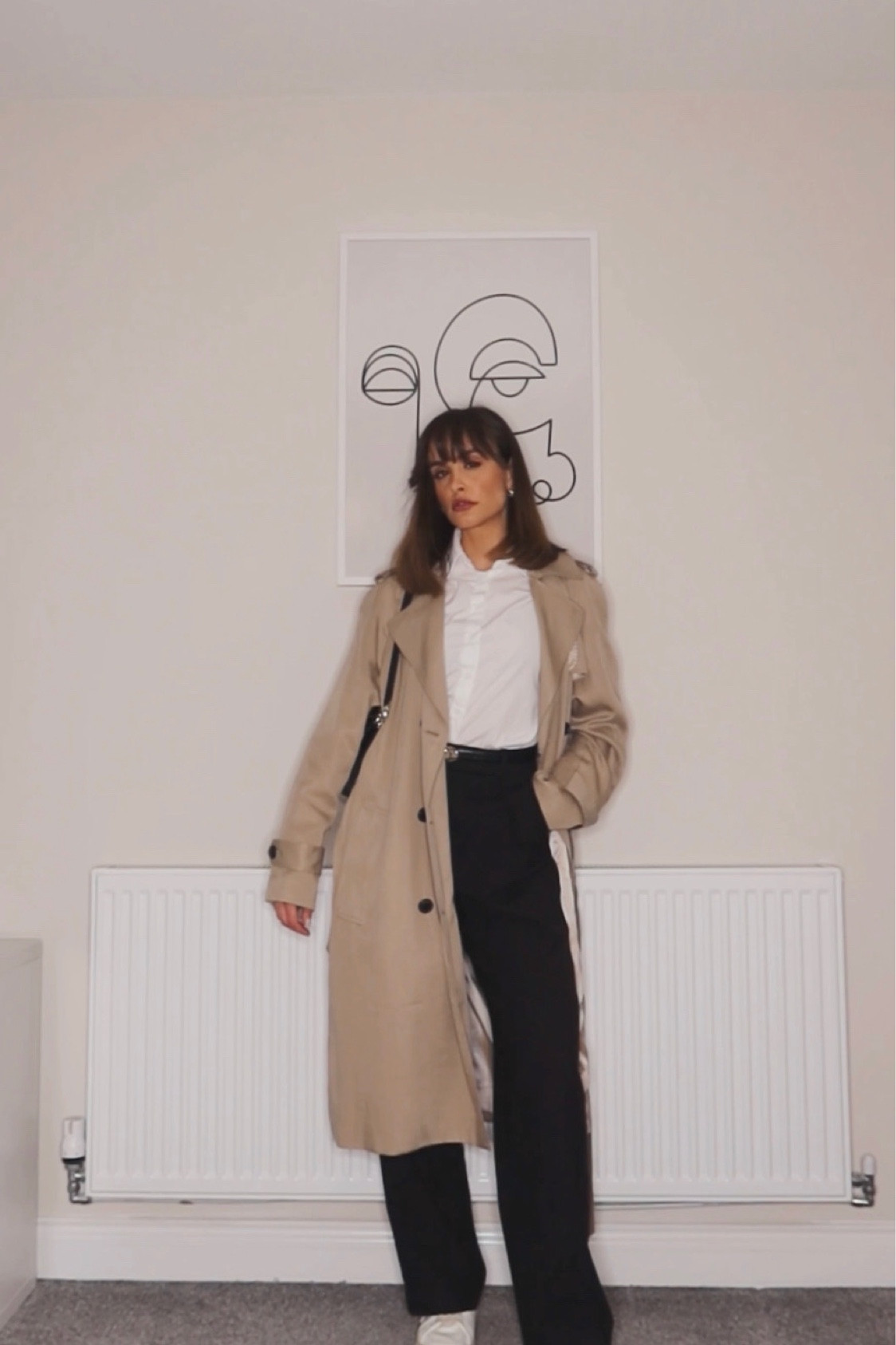 Brown trench coat, white shirt, black straight trousers, white trainers, black handbag, black belt 

#LTKstyletip #LTKeurope #LTKSeasonal