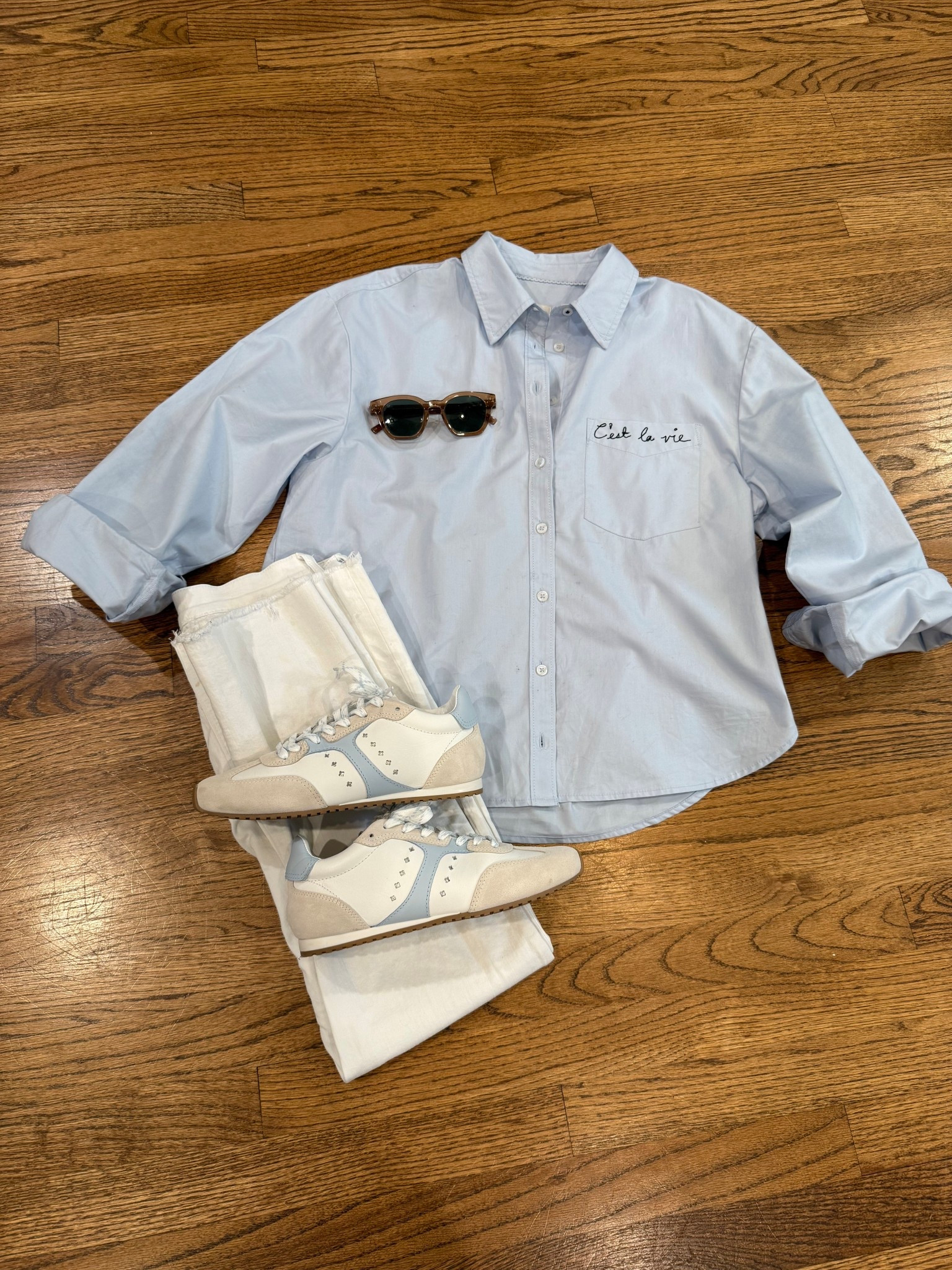 All true to size! Light blue top, white jeans, larroude shoes 