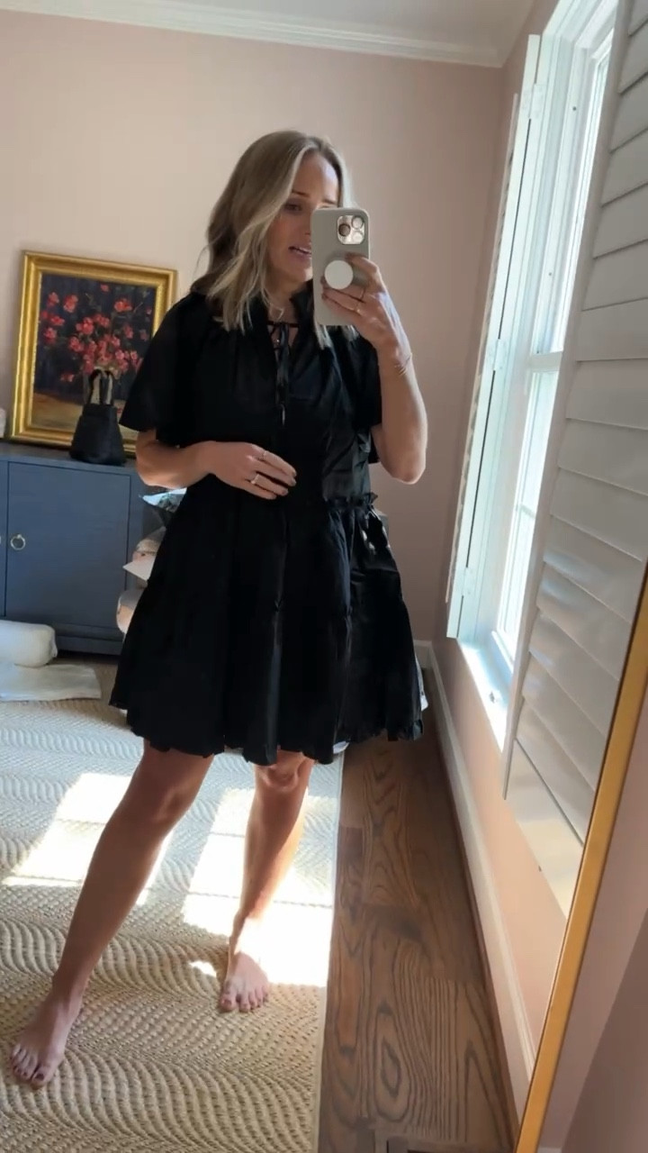 It's been a long time since I've found such a perfect black dress. It's ideal for this in-between summer and fall season– you can wear it with sandals for the next month or two, and then transition to boots, booties, sneakers, or clogs. I love the oversized flutter sleeves, the tiered skirt, and the small ruffled collar. It's relaxed and casual, yet still feminine and polished. AND the price is pretty good too. This black dress is one of those pieces you'll have in your closet for a LONG time. I ordered and love this dress, but just note that it runs big. Size down! 

#LTKstyletip #LTKSeasonal