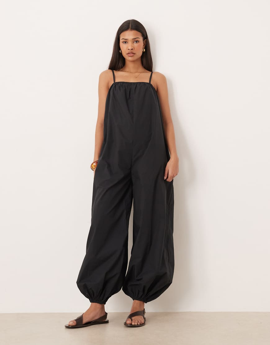 ASOS DESIGN balloon leg strappy jumpsuit in black | ASOS (Global)