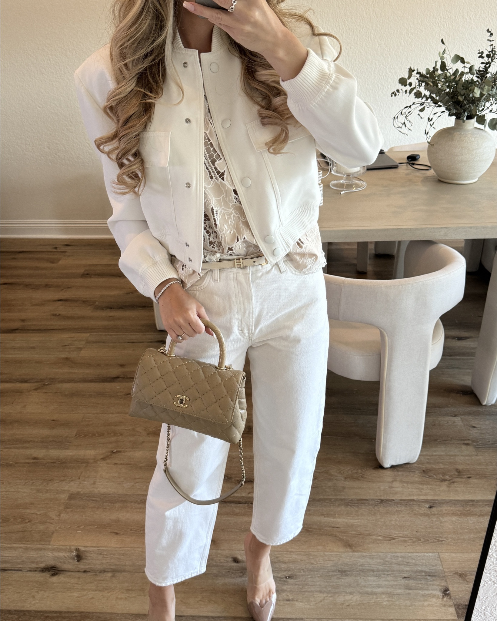 Effortless chic wearing an oversized bomber jacket, white straight pants and a chic embroidered lace top 🤎 #chicstyle 

#LTKSeasonal #LTKstyletip