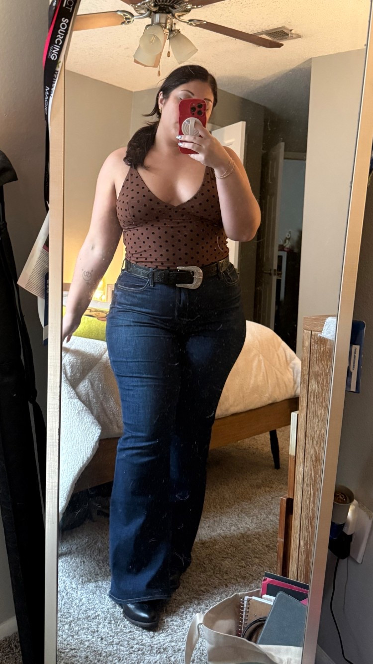Cowgirl casual 🤎✨ This polka dot top is such a cute staple for dressing up your everyday denim! Paired it with my favorite high-waisted flares, a western belt, and boots for the perfect mix of comfy and country. This look is perfect for a casual night out, line dancing, or grabbing drinks with friends! 🤠🖤

Jeans are a size 14. Top is a size large. Boots are a size 8. 

#LTKdayinmylife #LTKootd #LTKMidsize