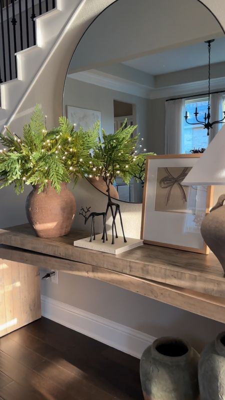 My light up branches are an absolute must this holiday season!! They take all your arrangements up a notch! I have both the plug in type and the battery operated type for arrangements that don’t have anywhere to connect to. 

In my entryway I have a total of 6 branches and 2 branches in my kitchen and dining room vases!!

#LTKsalealert #LTKCyberWeek #LTKhome