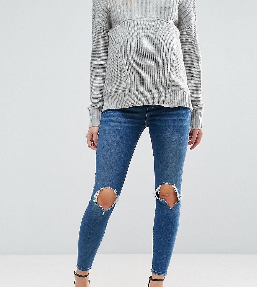 ASOS MATERNITY RIDLEY Skinny Jeans in Roy Dark Stonewash with Busted Knees With Under the Bump Waistband - Blue | ASOS US
