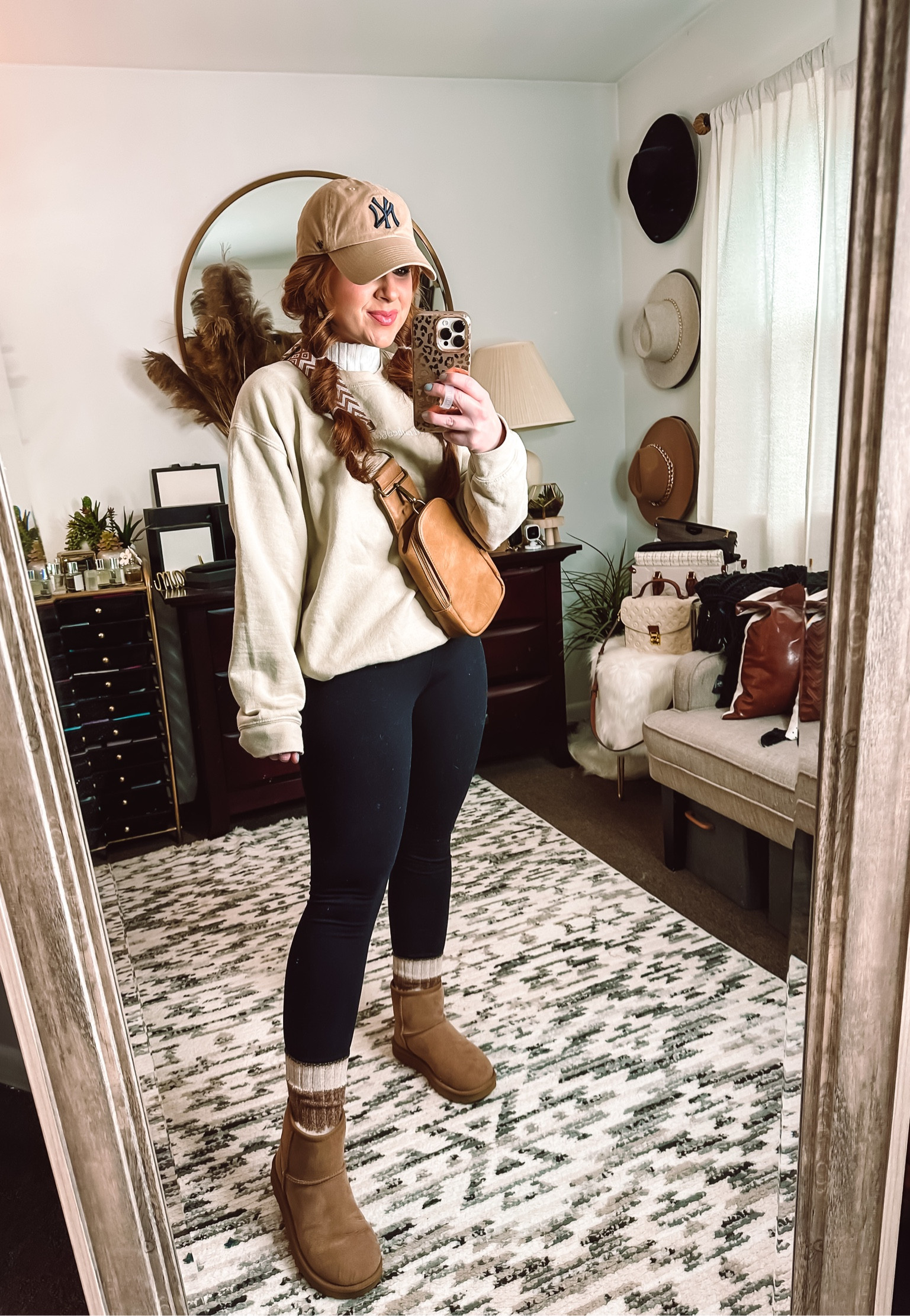 Casual running errands fit! 

Yankees 47 hat, white ribbed mock neck, United monograms nude sweatshirt, black 90 degree leggings from amazon, scrunchy socks form American eagle, Uggs, cross body belt bag from pink lily ! Also a great travel outfit 

#LTKGiftGuide #LTKtravel #LTKunder50
