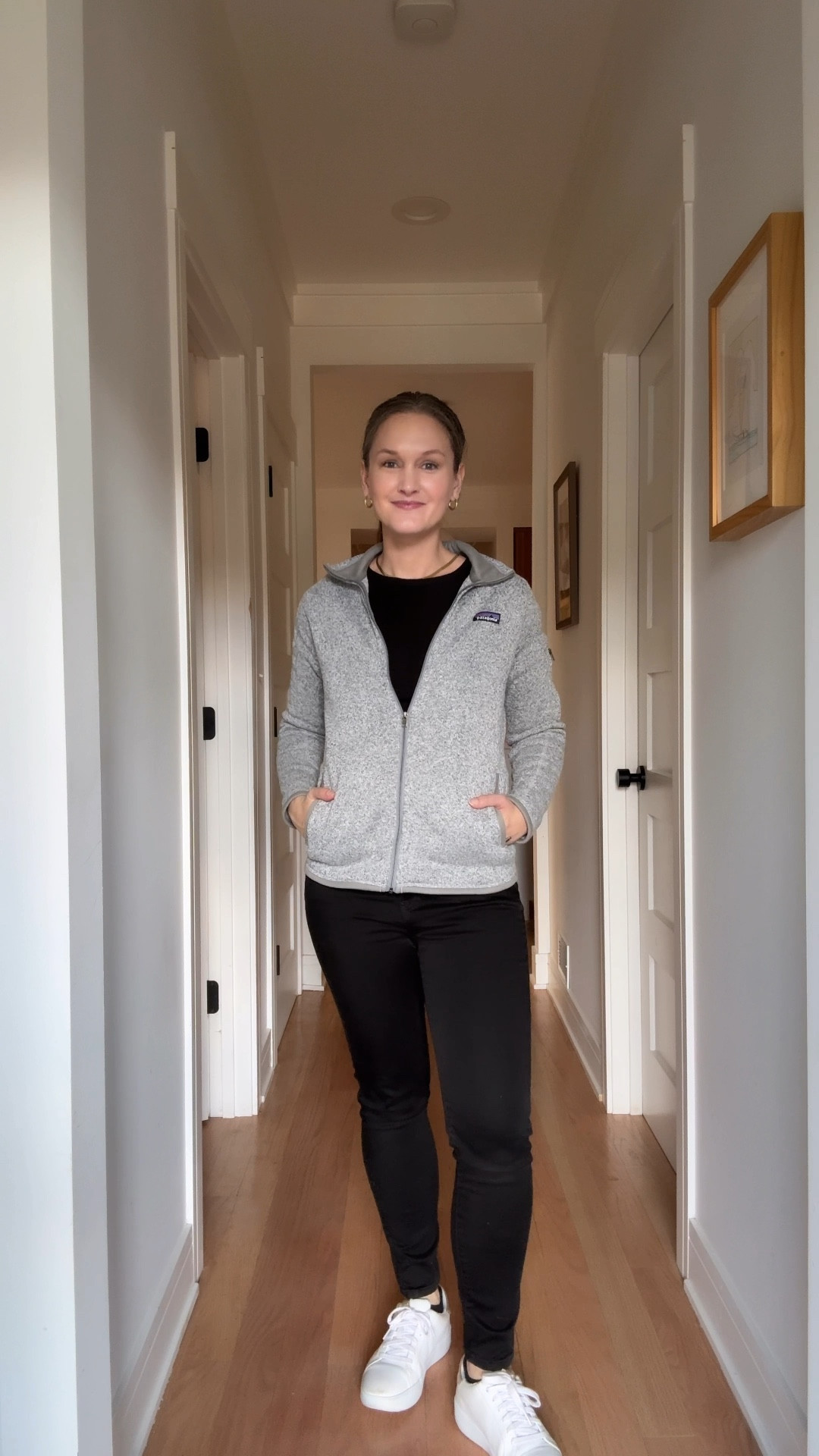 On Tuesday in Chicago, she kept things effortlessly cool and casual, proving that mom style doesn’t have to be complicated to look great. Black skinny jeans that hugged just right, a cropped black crew neck tee layered under a gray zip-up jacket that had just the right amount of athleisure vibes, and white leather sneakers for when you need to keep up with a toddler on the move. Her go-to gold herringbone necklace and hoops were the perfect finishing touch—simple, timeless, and always on point. After the morning spent in cowork/daycare mode, the afternoon was all about fresh air and swings, watching her little one run wild on the playground, savoring the sweet simplicity of a Tuesday that was both productive and playful.

#LTKFamily #LTKWorkwear #LTKStyleTip