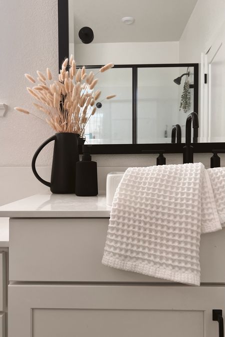 Simple bathroom decor! 

Neutral home. Bathroom. White towel. Waffle knit towel. Vase. Florals  

#LTKFindsUnder50 #LTKHome #LTKFindsUnder100