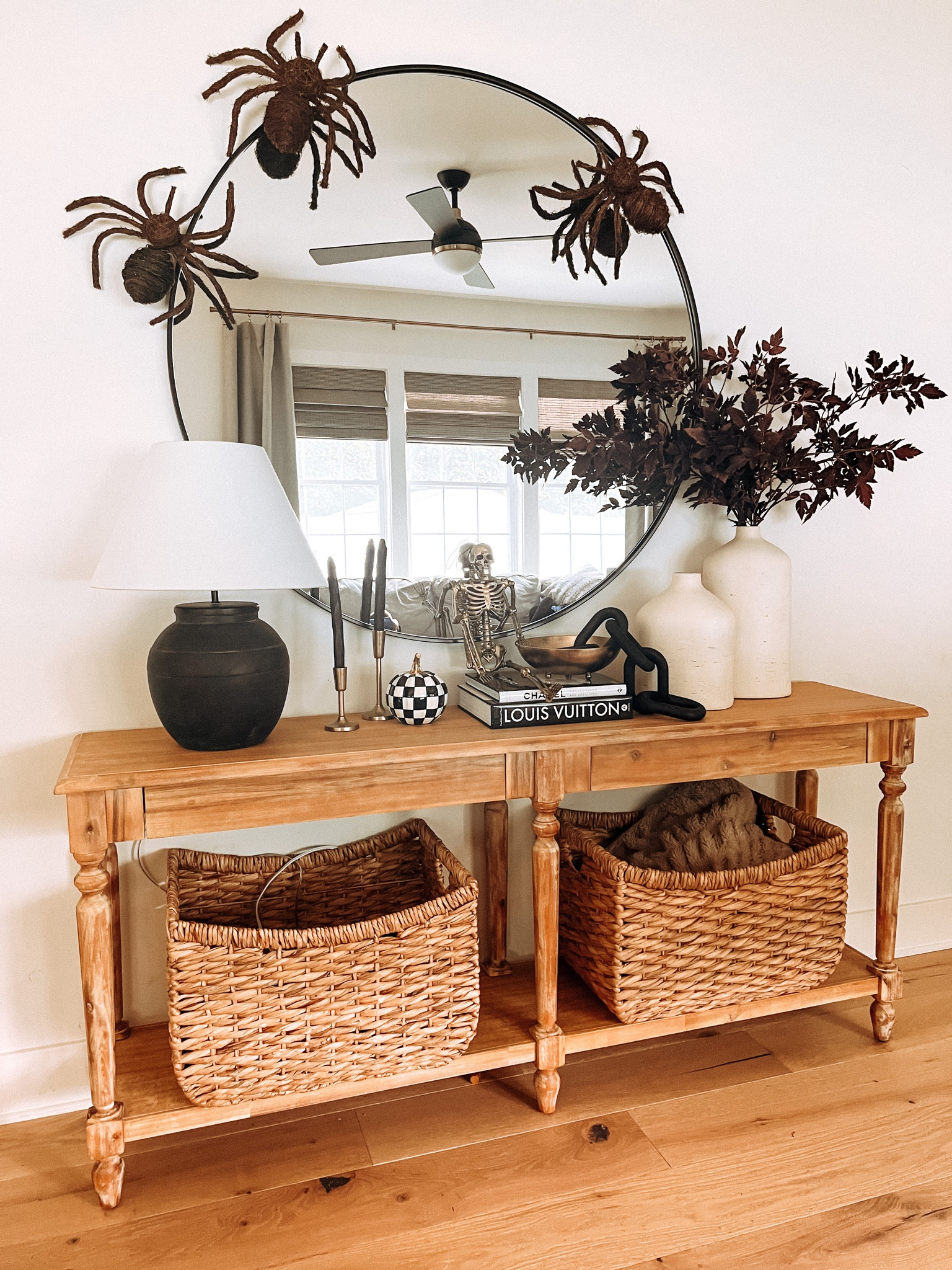 Finally getting out fall and a mix of Halloween decor out // rattan spiders // entry table // Afloral stems // mackenzie Childs pumpkin // Louis Vuitton book // Halloween decor // fall decor // home decor 

#LTKhome #LTKHalloween #LTKSeasonal